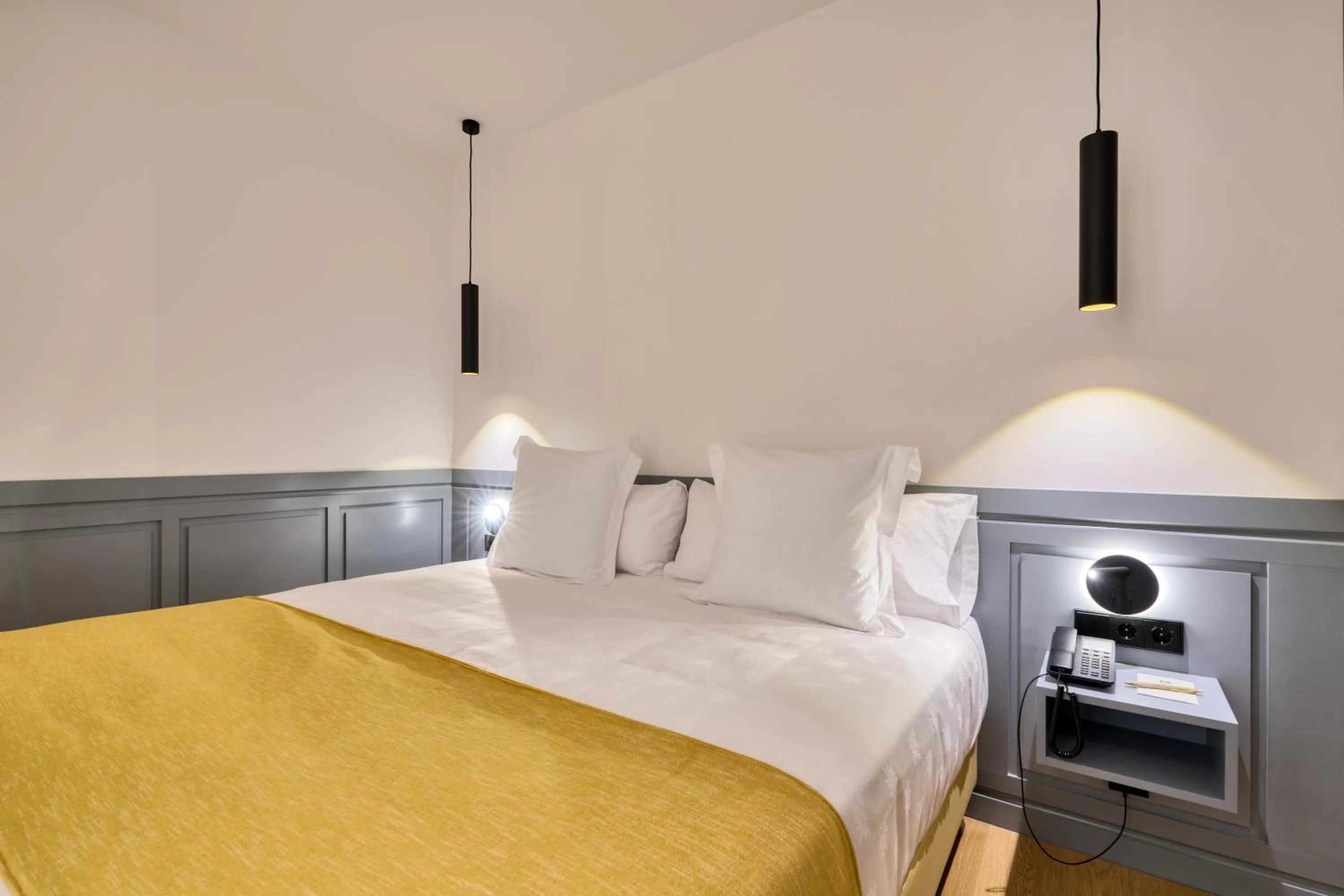 Bed in Hotel Murillo Reinoso