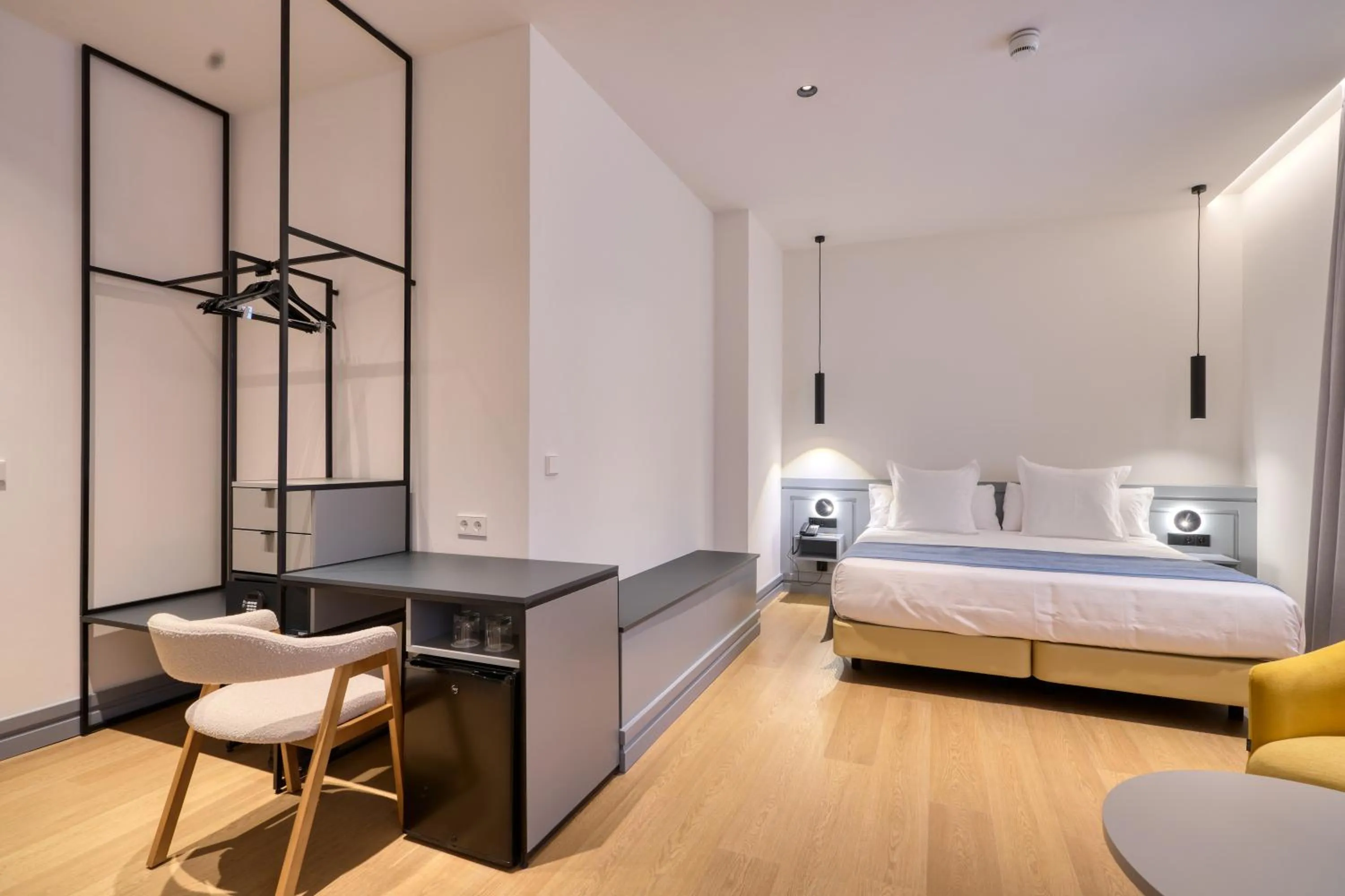 Bed in Hotel Murillo Reinoso