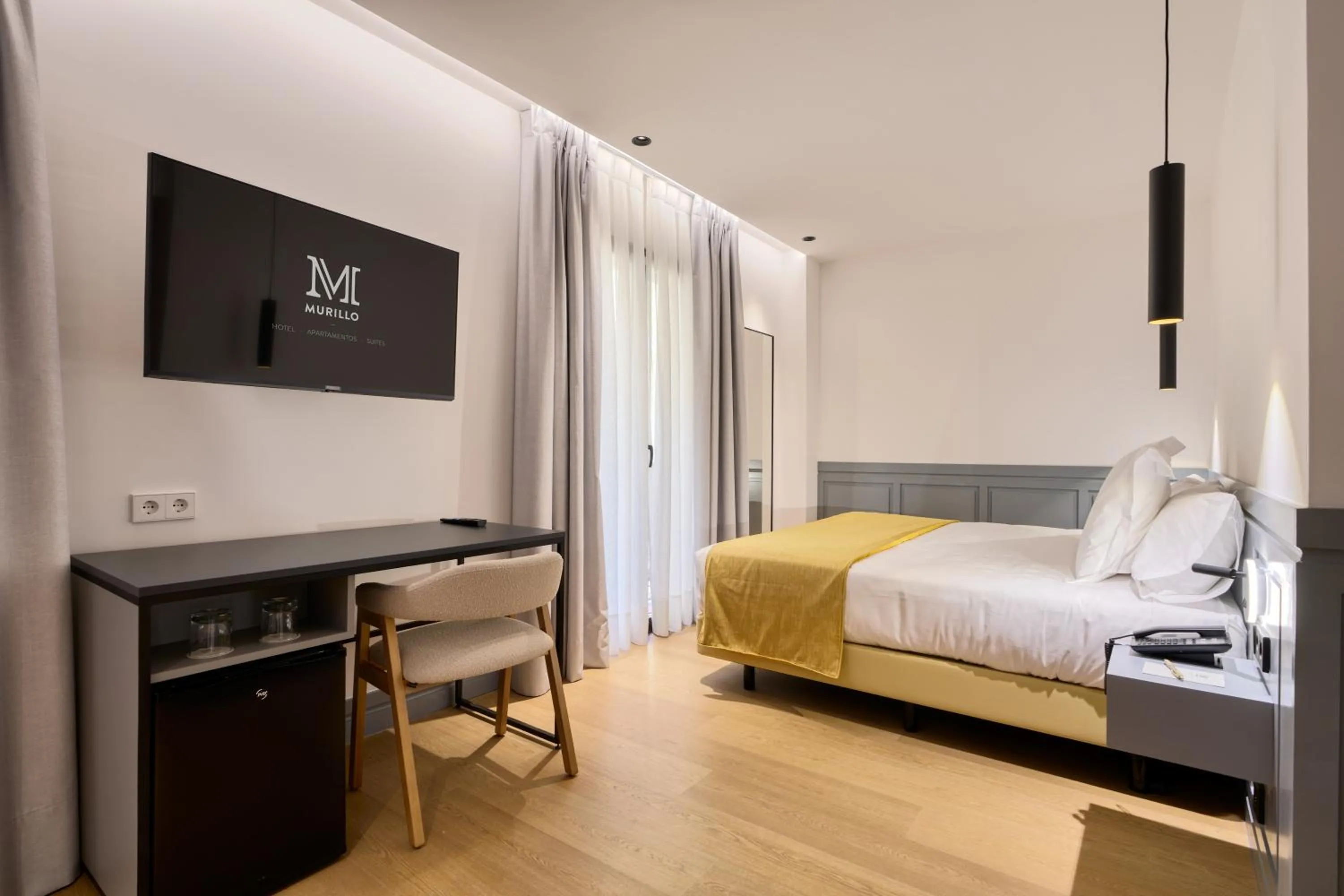 Bed in Hotel Murillo Reinoso