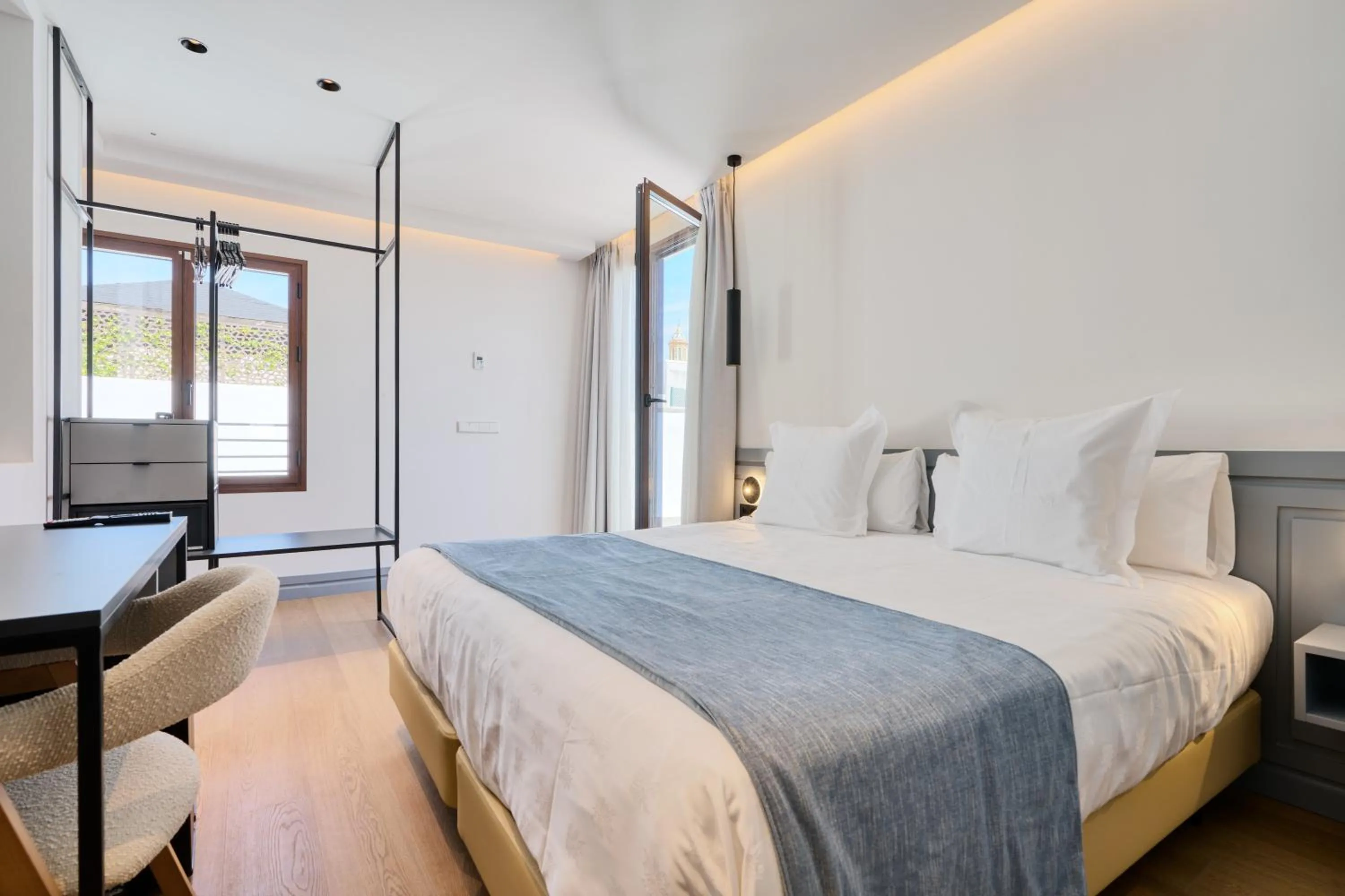 Bed in Hotel Murillo Reinoso