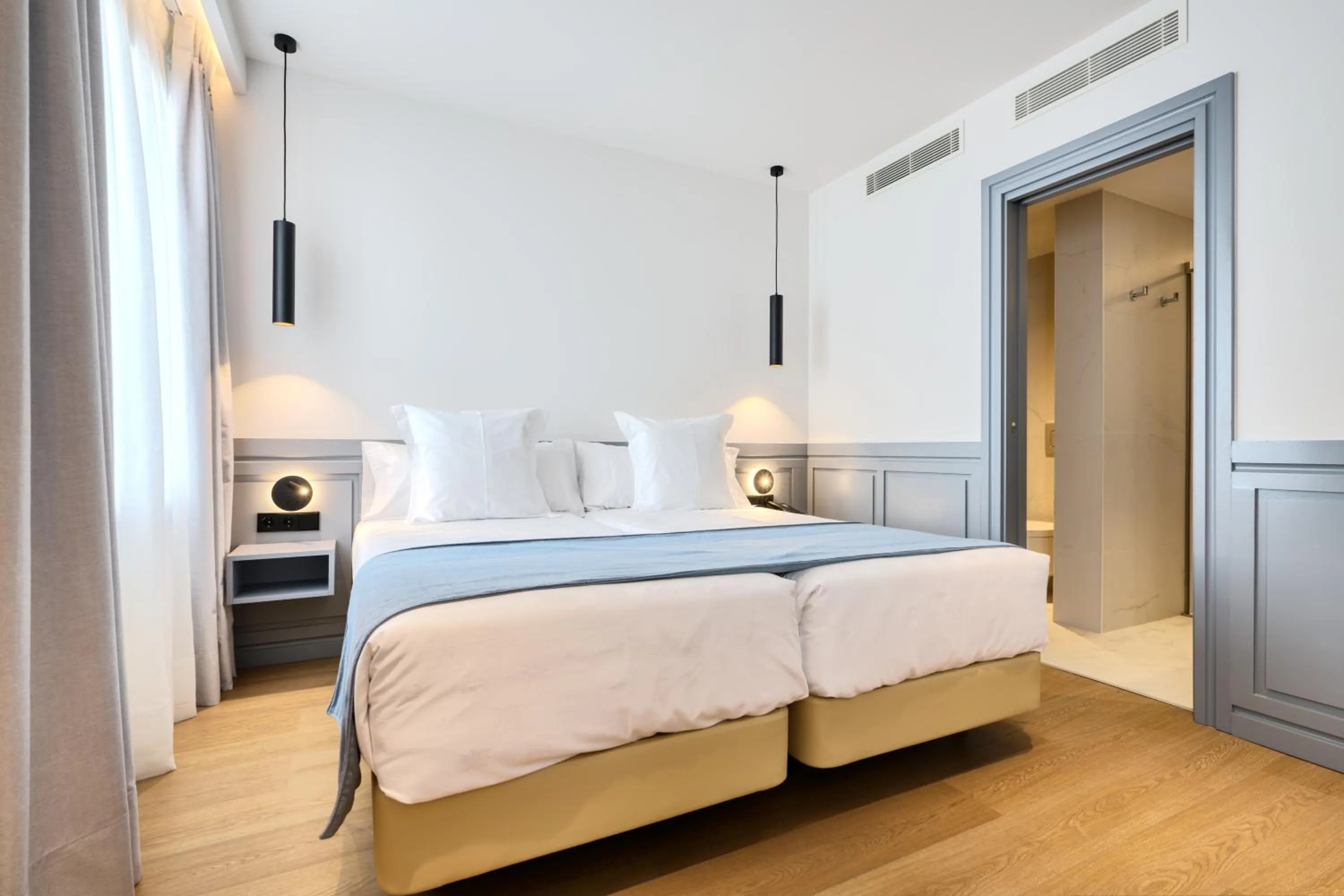 Bed in Hotel Murillo Reinoso