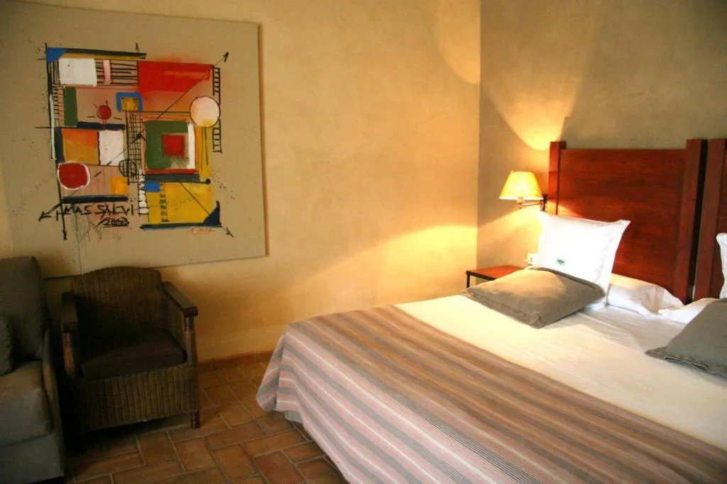 Bed in Mas Salvi Country Boutique Hotel