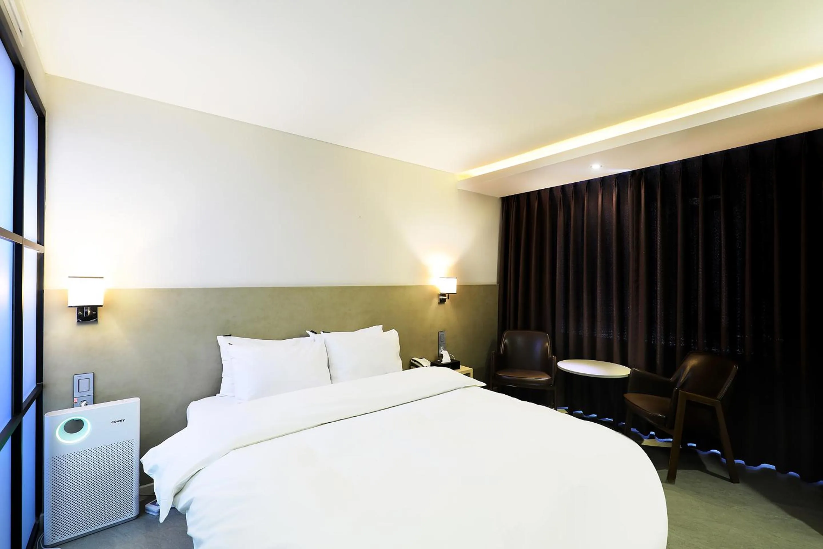 Bed in CS Avenue Tourist Hotel