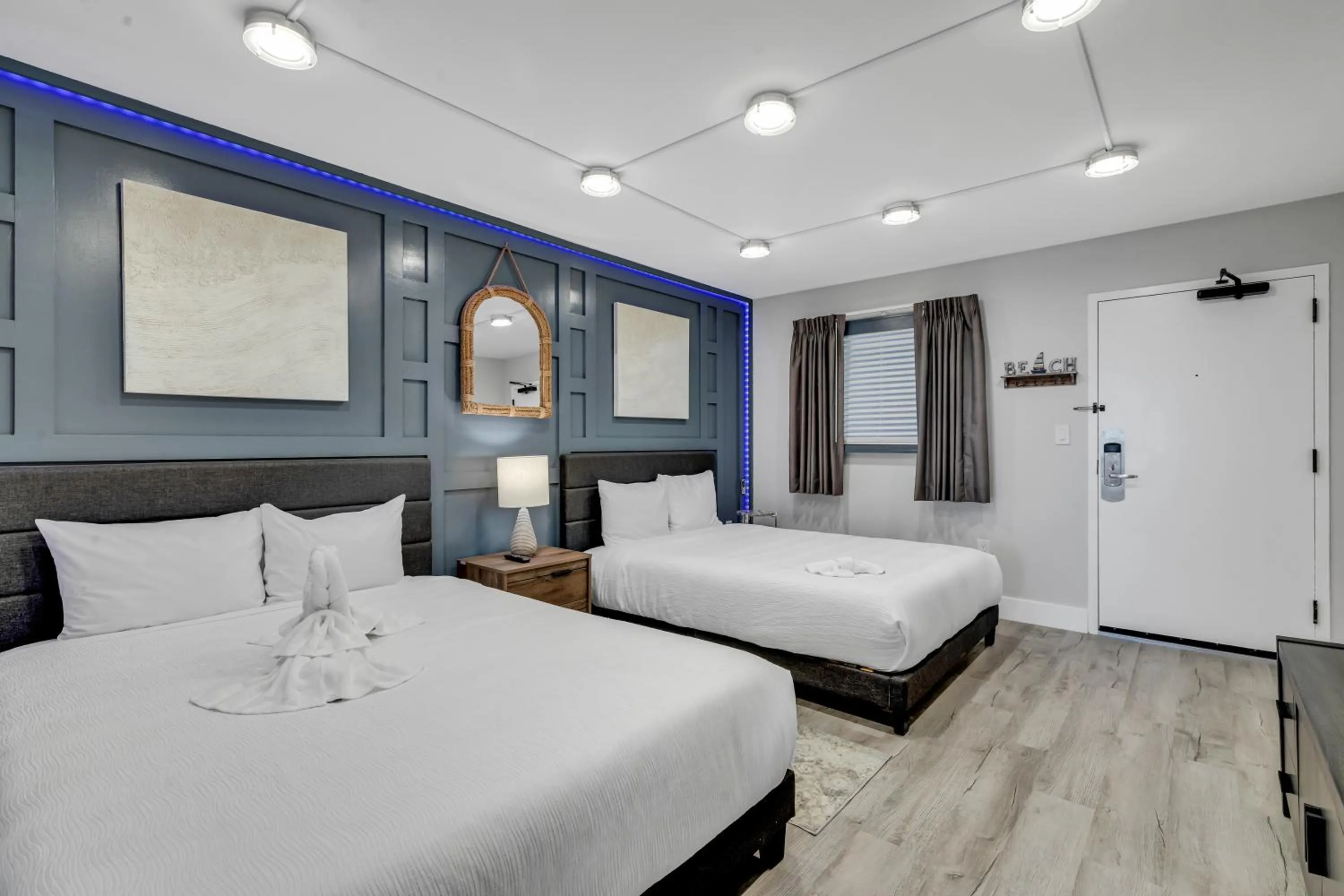 Bedroom, Bed in Breakers Tower 1BR Oceanfront Condo