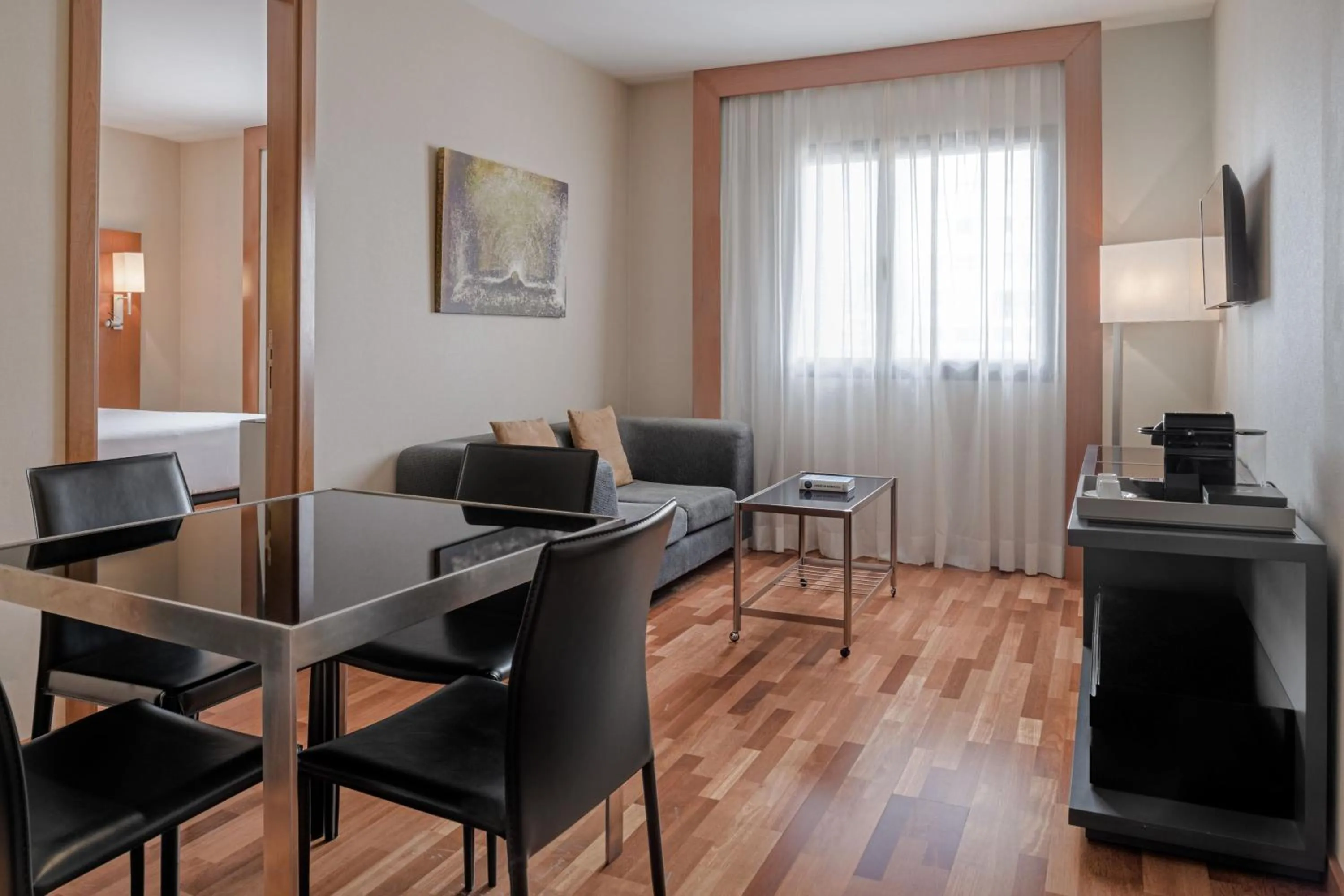 Living room in AC Hotel Murcia by Marriott