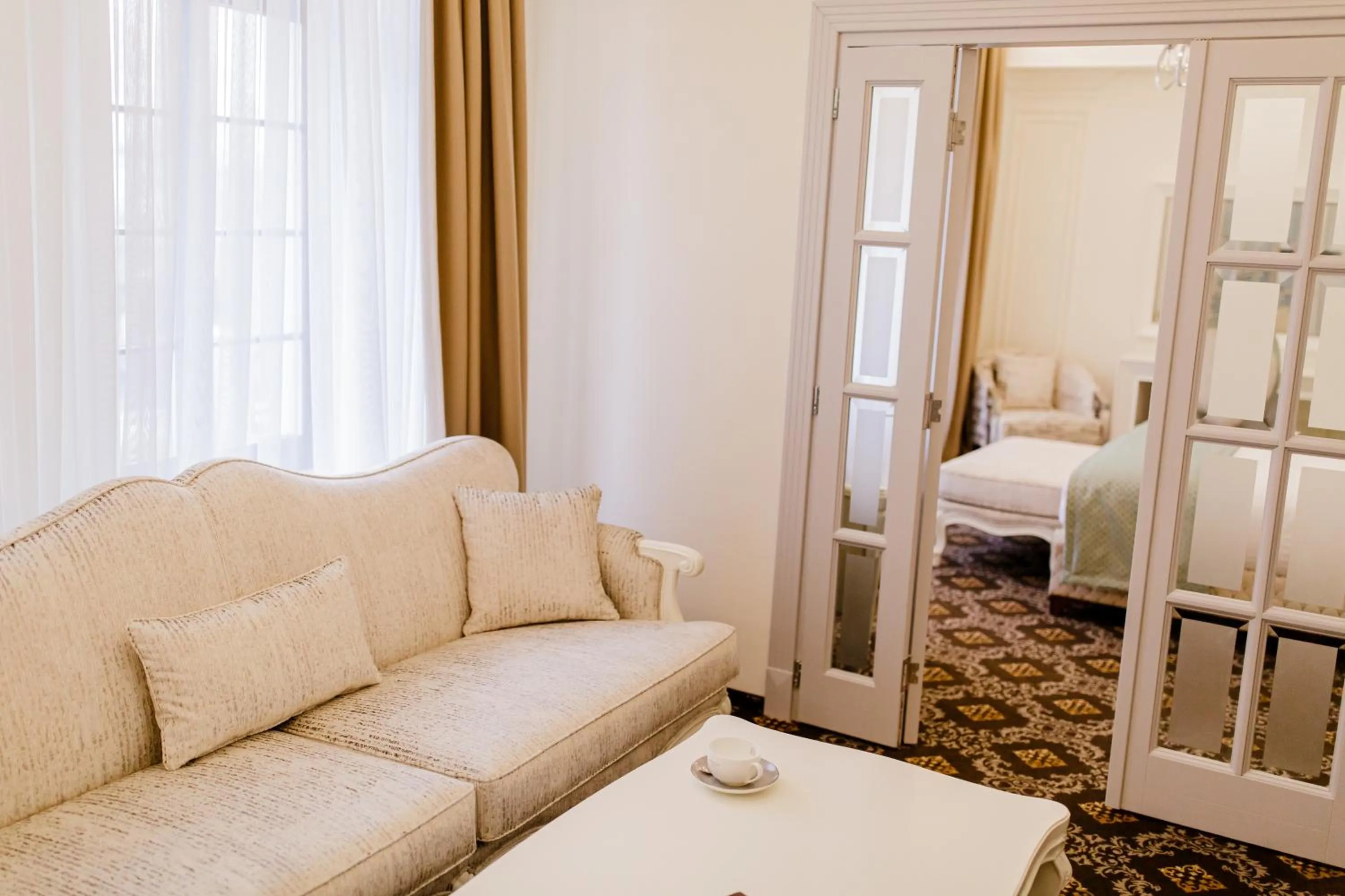 Bed in Muller Hotel Boutique & Spa