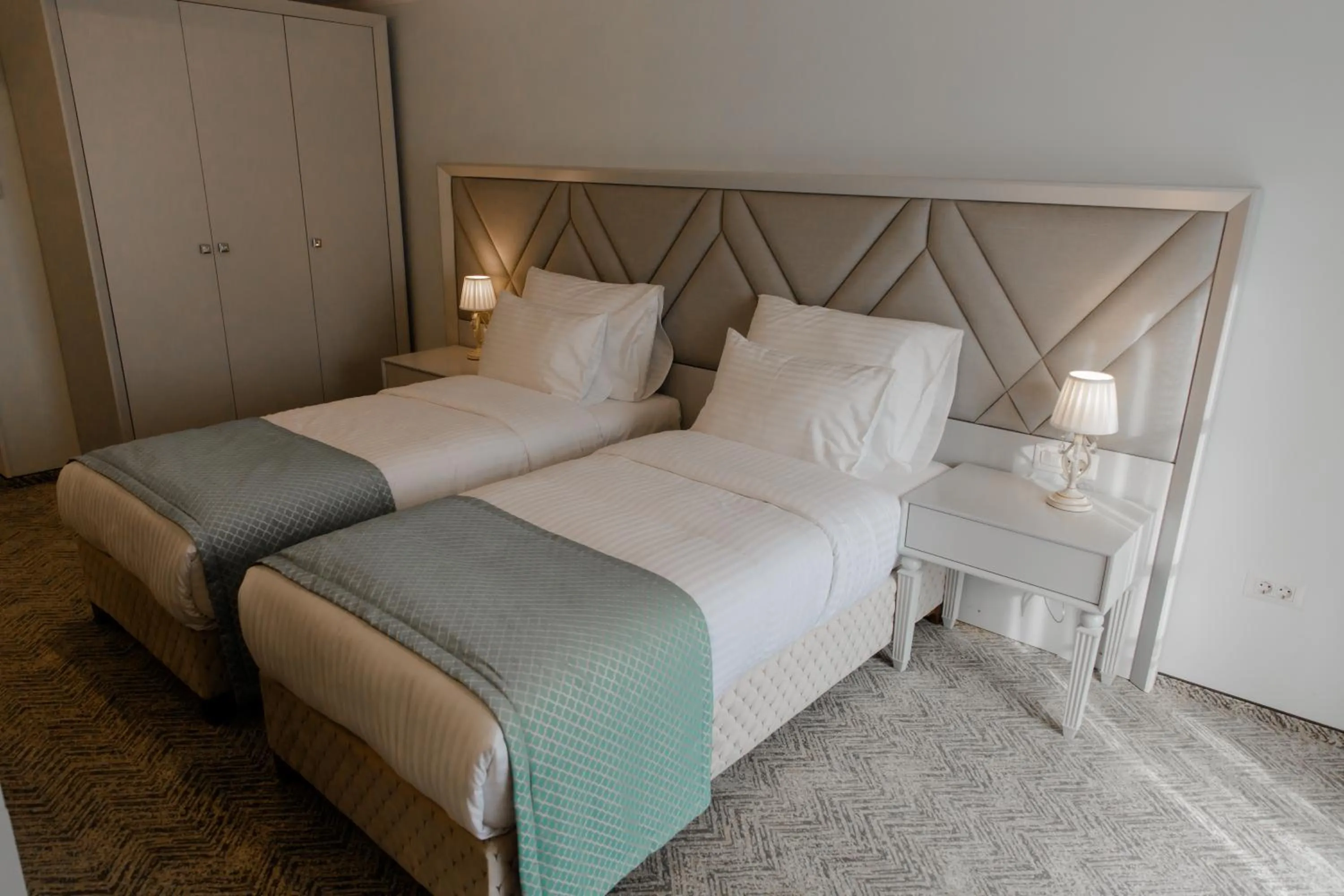 Bed in Muller Hotel Boutique & Spa