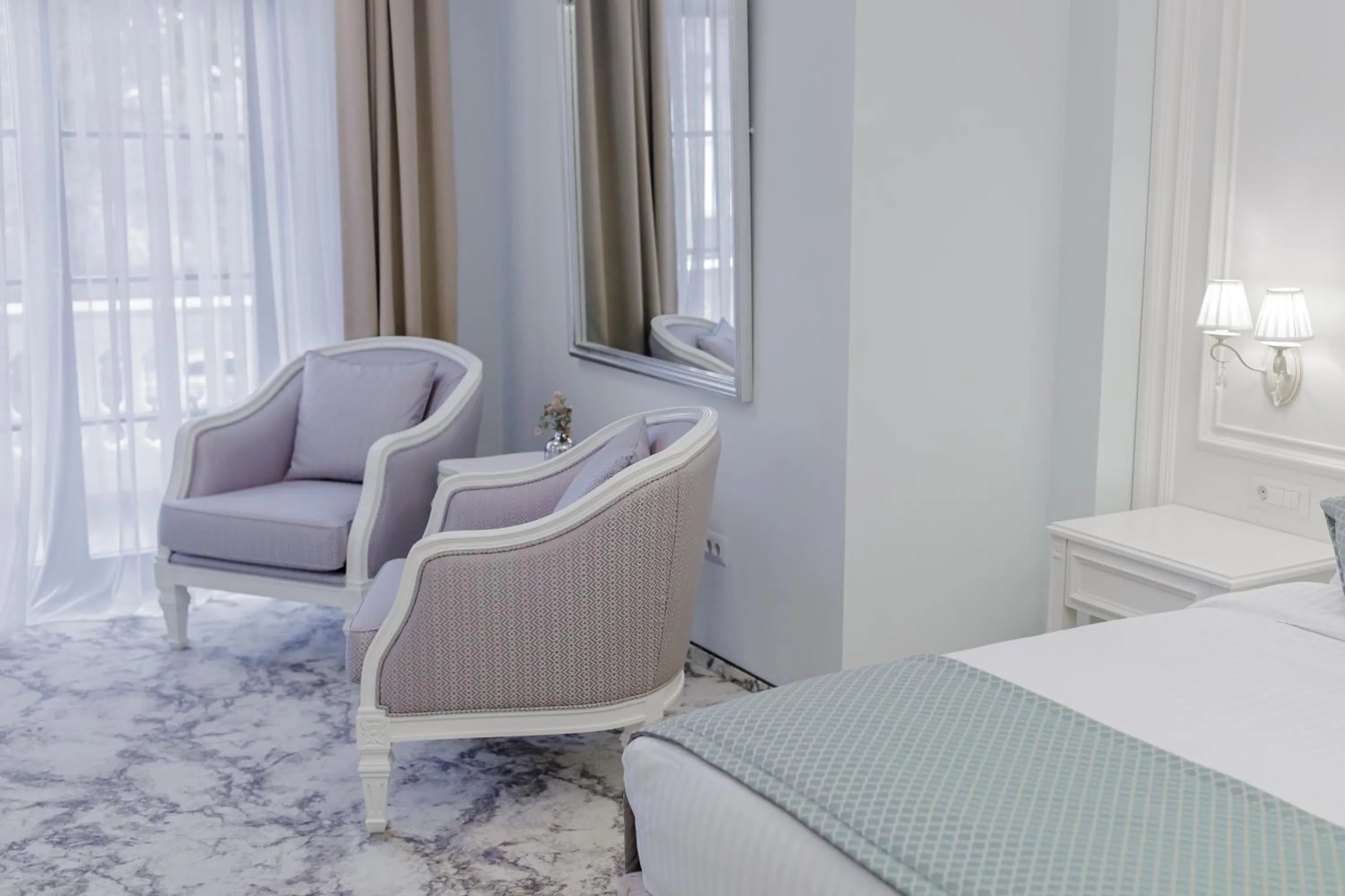 Bed in Muller Hotel Boutique & Spa