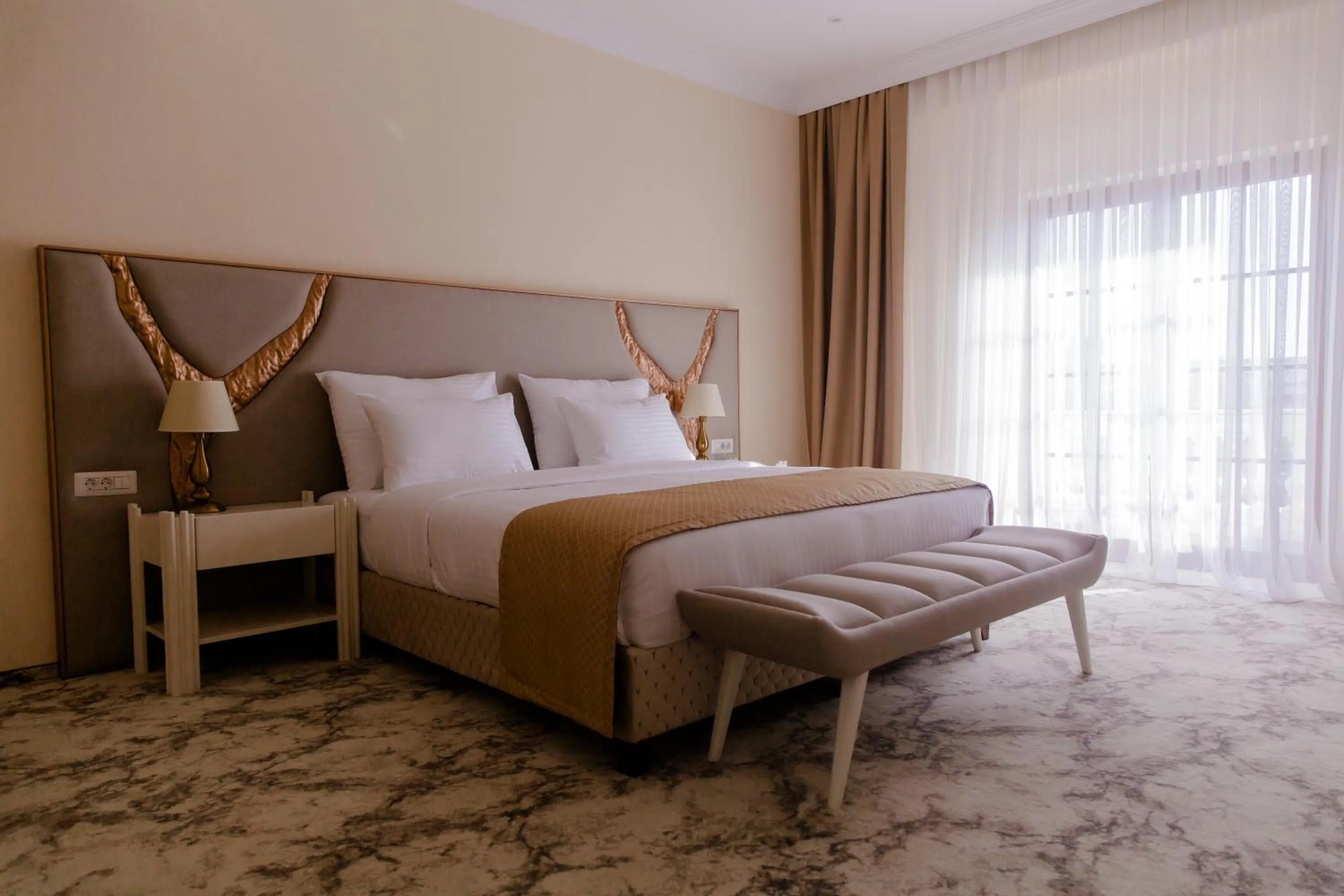 Bed in Muller Hotel Boutique & Spa