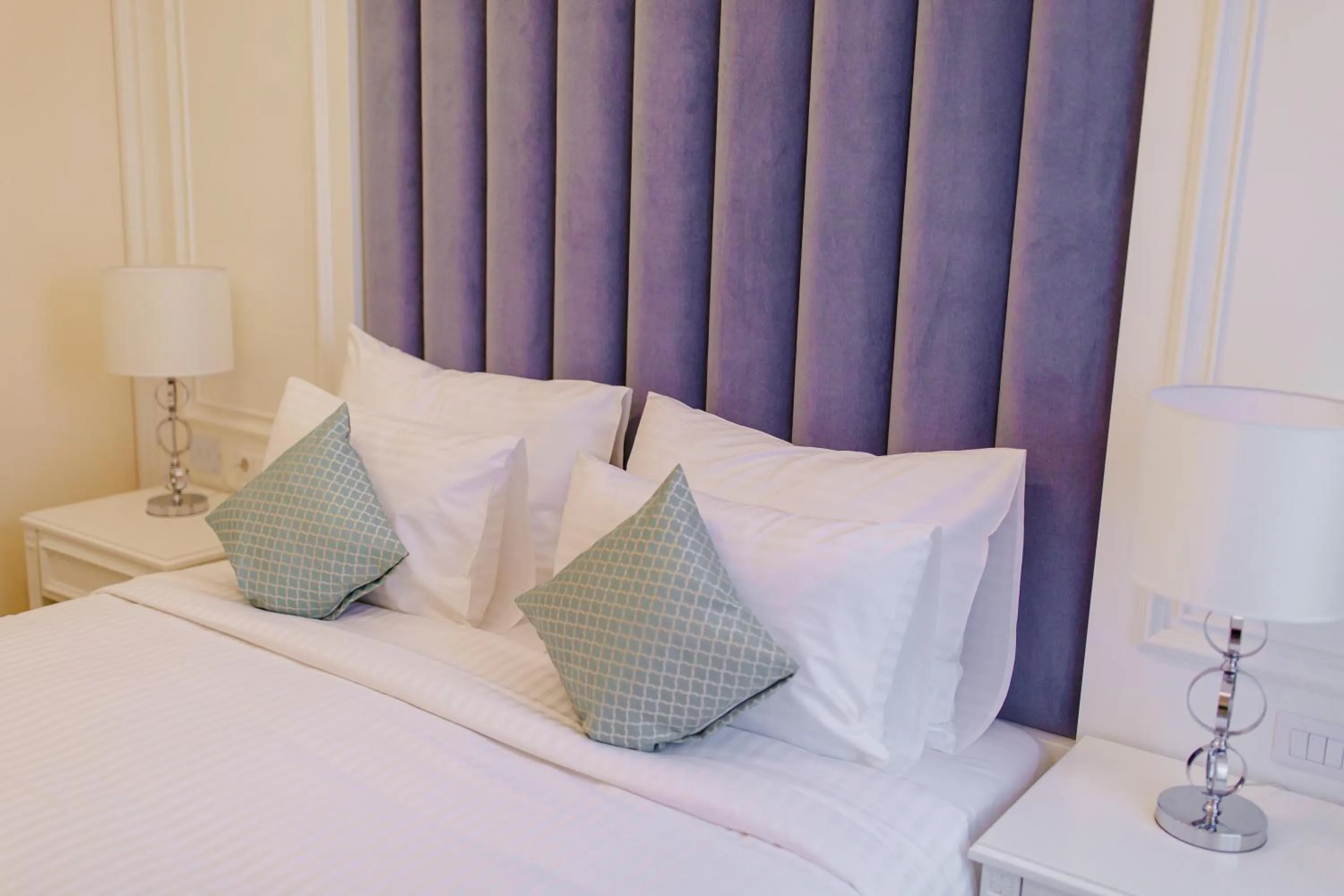 Bed in Muller Hotel Boutique & Spa