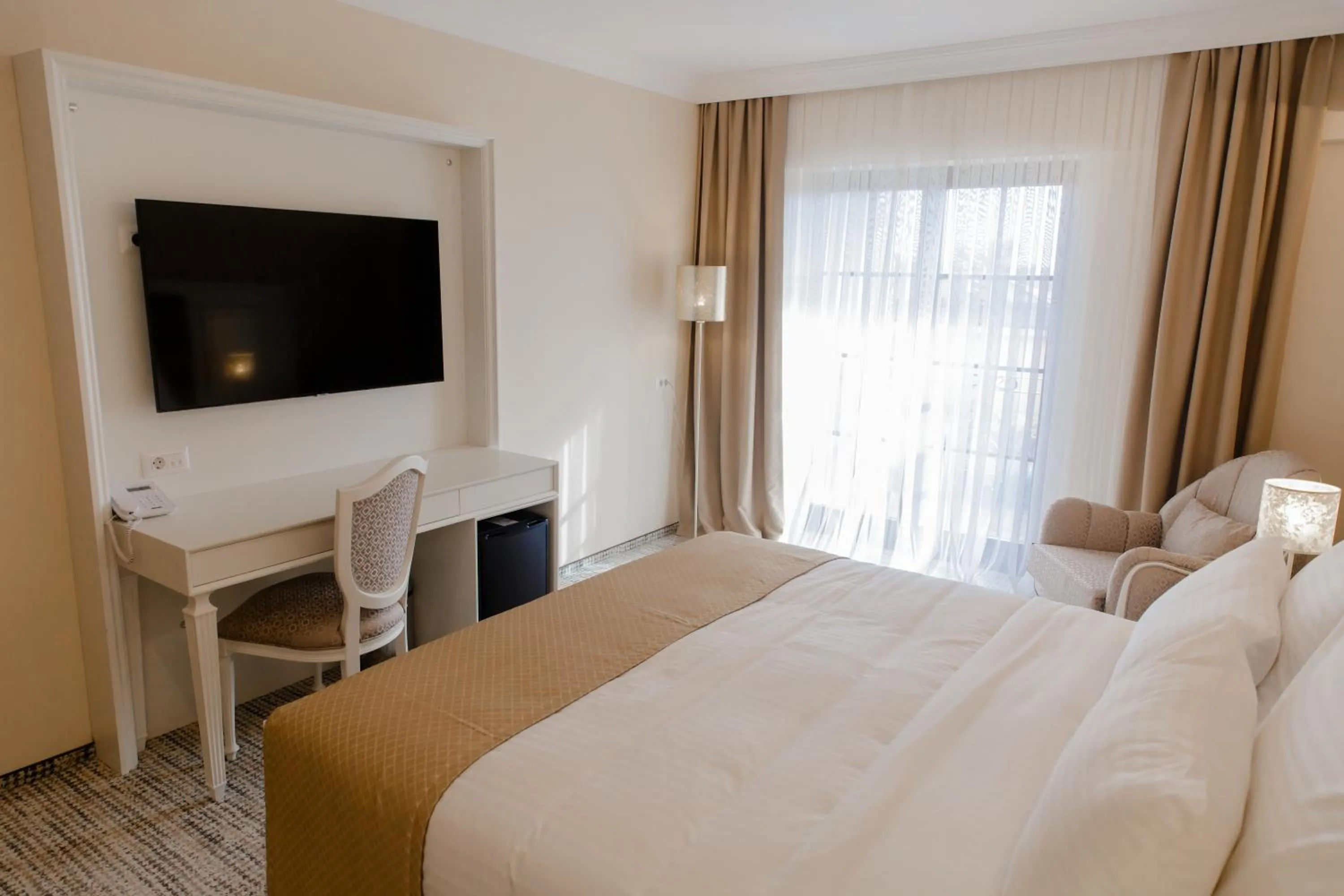 Bed in Muller Hotel Boutique & Spa