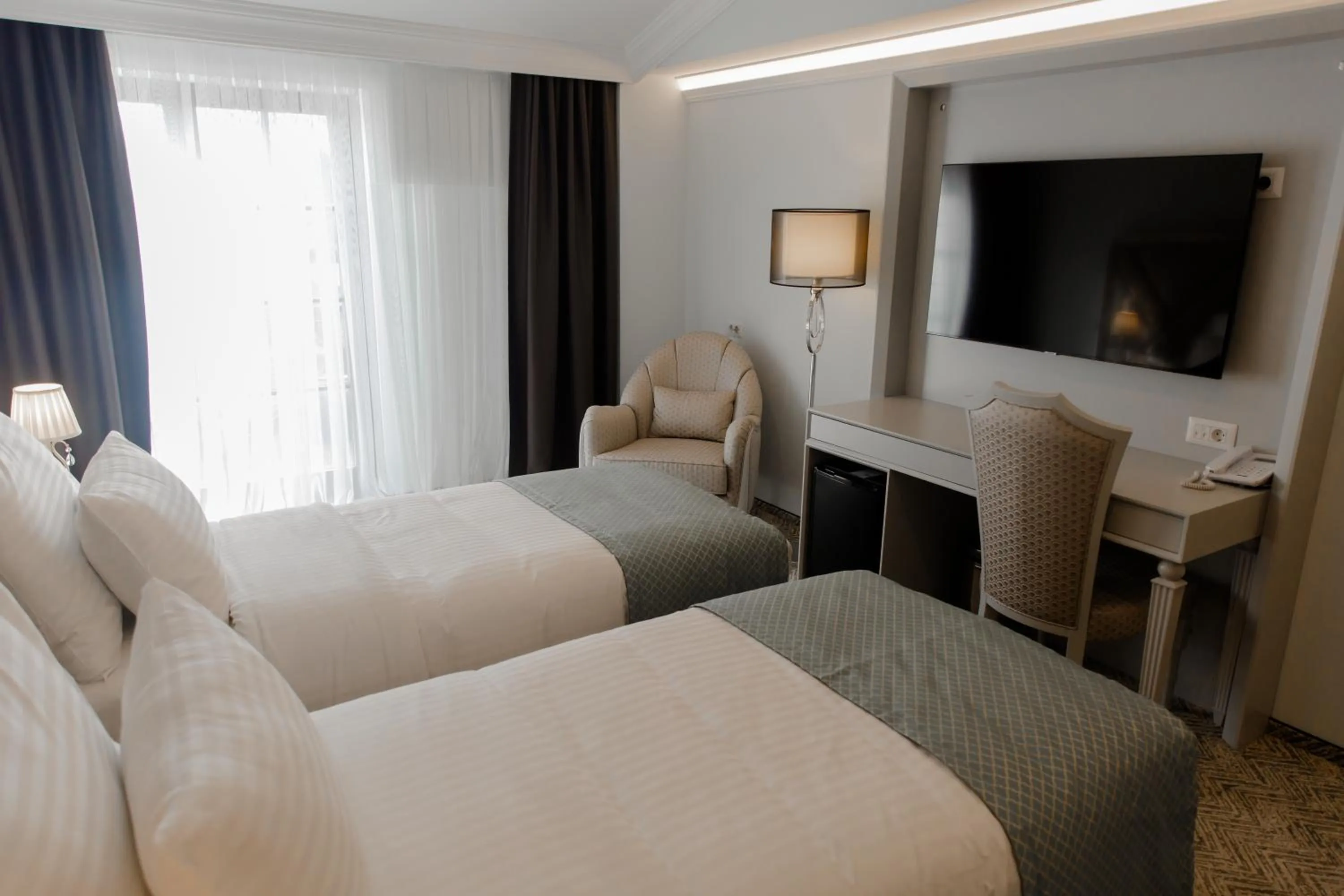 Bed in Muller Hotel Boutique & Spa