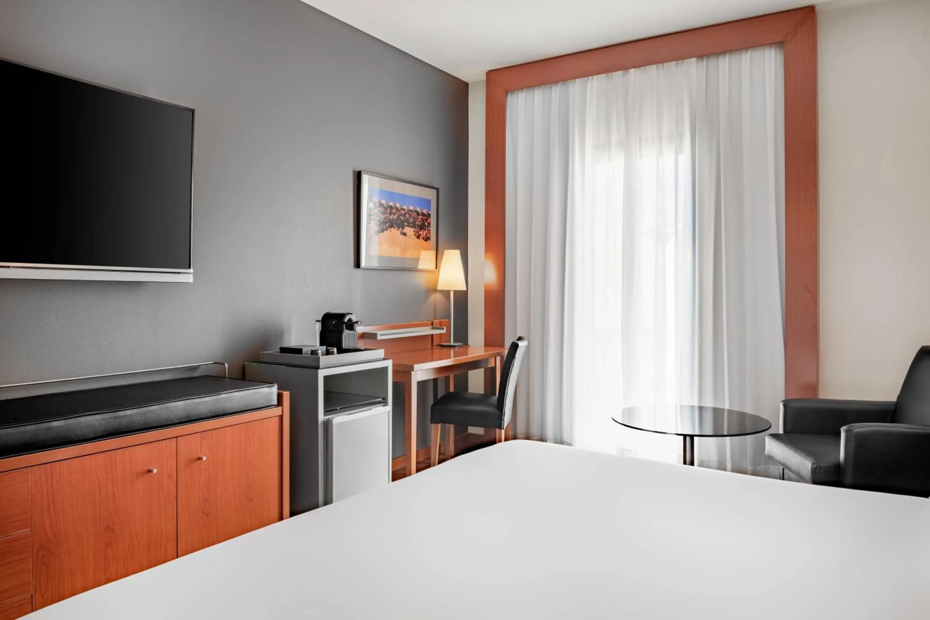 Photo of the whole room, Bed in AC Hotel Badajoz by Marriott