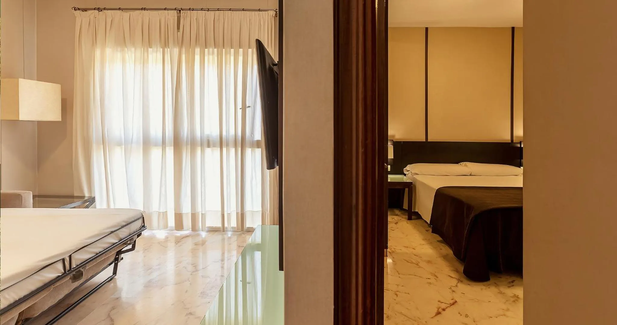 Living room, Bed in Apartamentos Vértice Bib Rambla