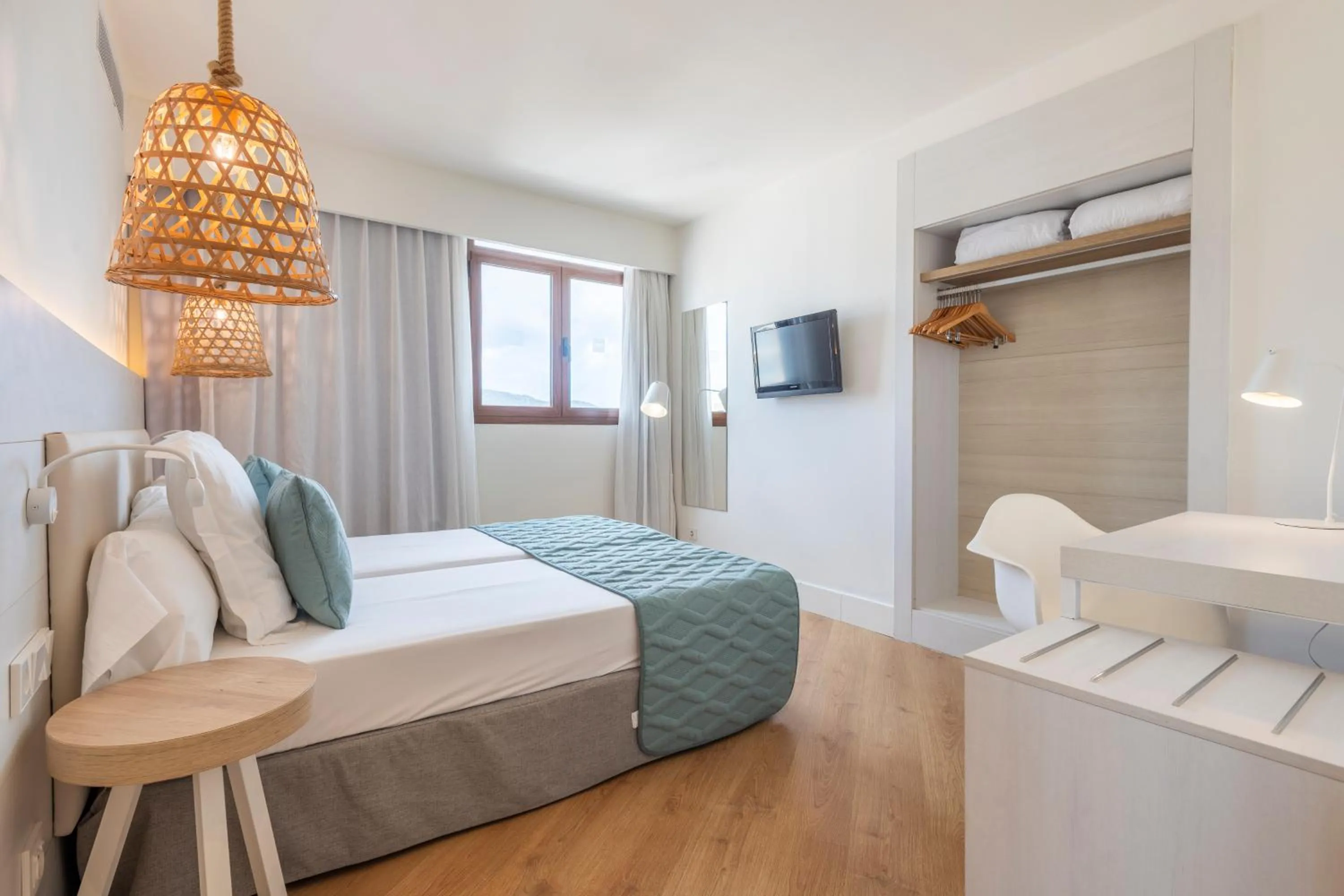 Bedroom, Bed in Leonardo Royal Hotel Ibiza Santa Eulalia