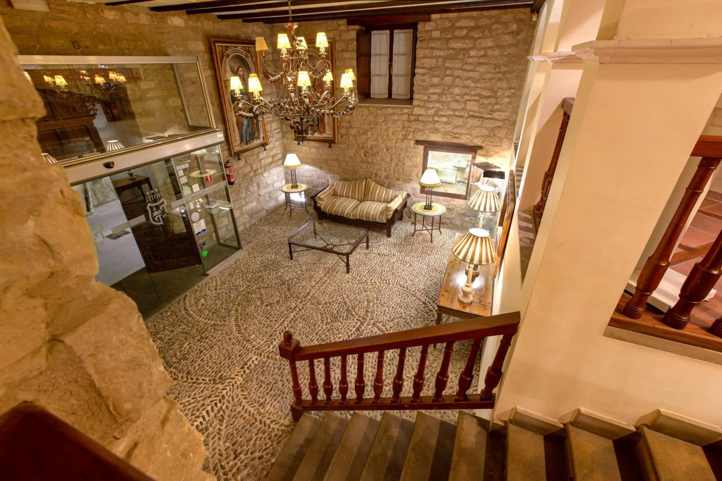 Lobby or reception in Hotel Palacio Pujadas by Pandora Hoteles