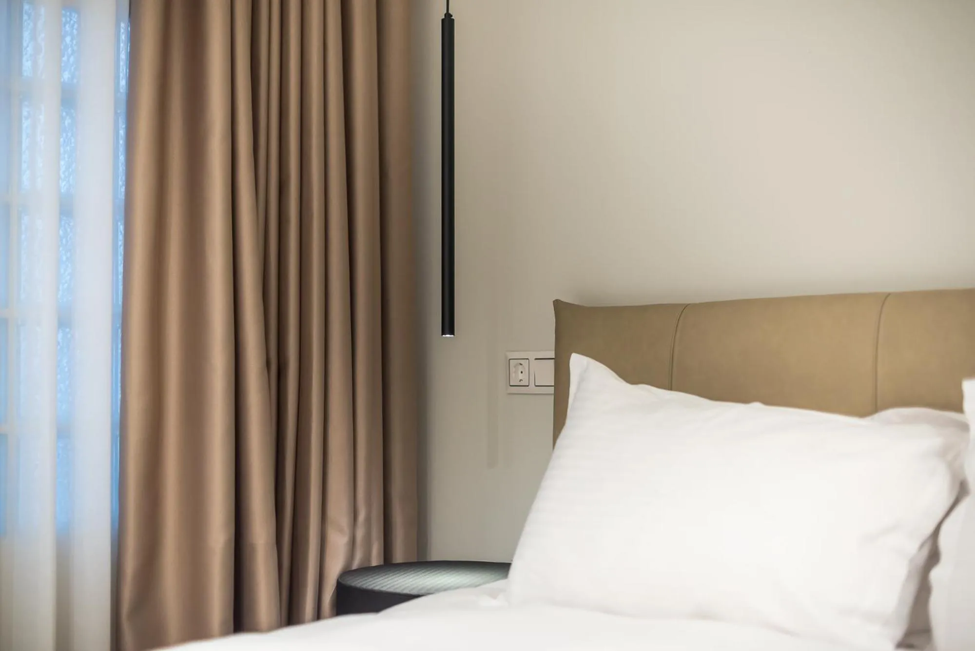 Bed in Aeiphoria Suites & Rooms - Athens