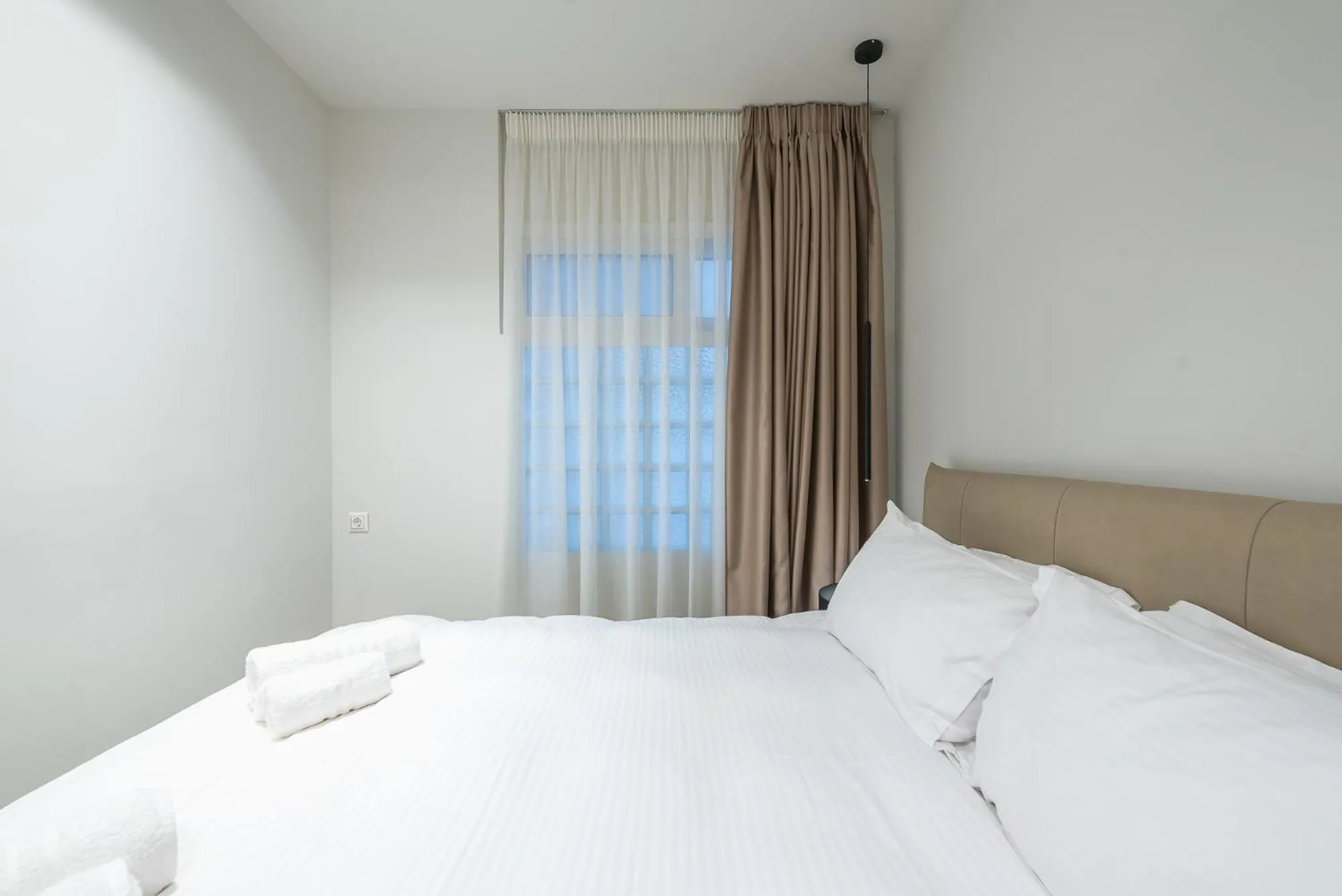 Bed in Aeiphoria Suites & Rooms - Athens