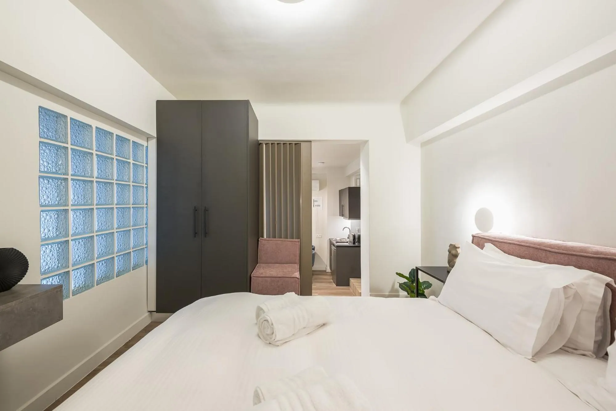 Bed in Aeiphoria Suites & Rooms - Athens