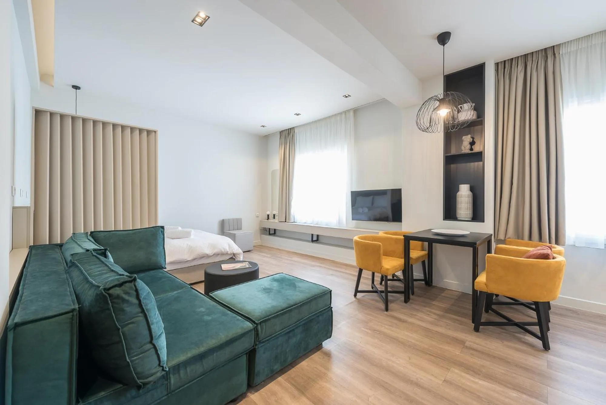 Bed in Aeiphoria Suites & Rooms - Athens