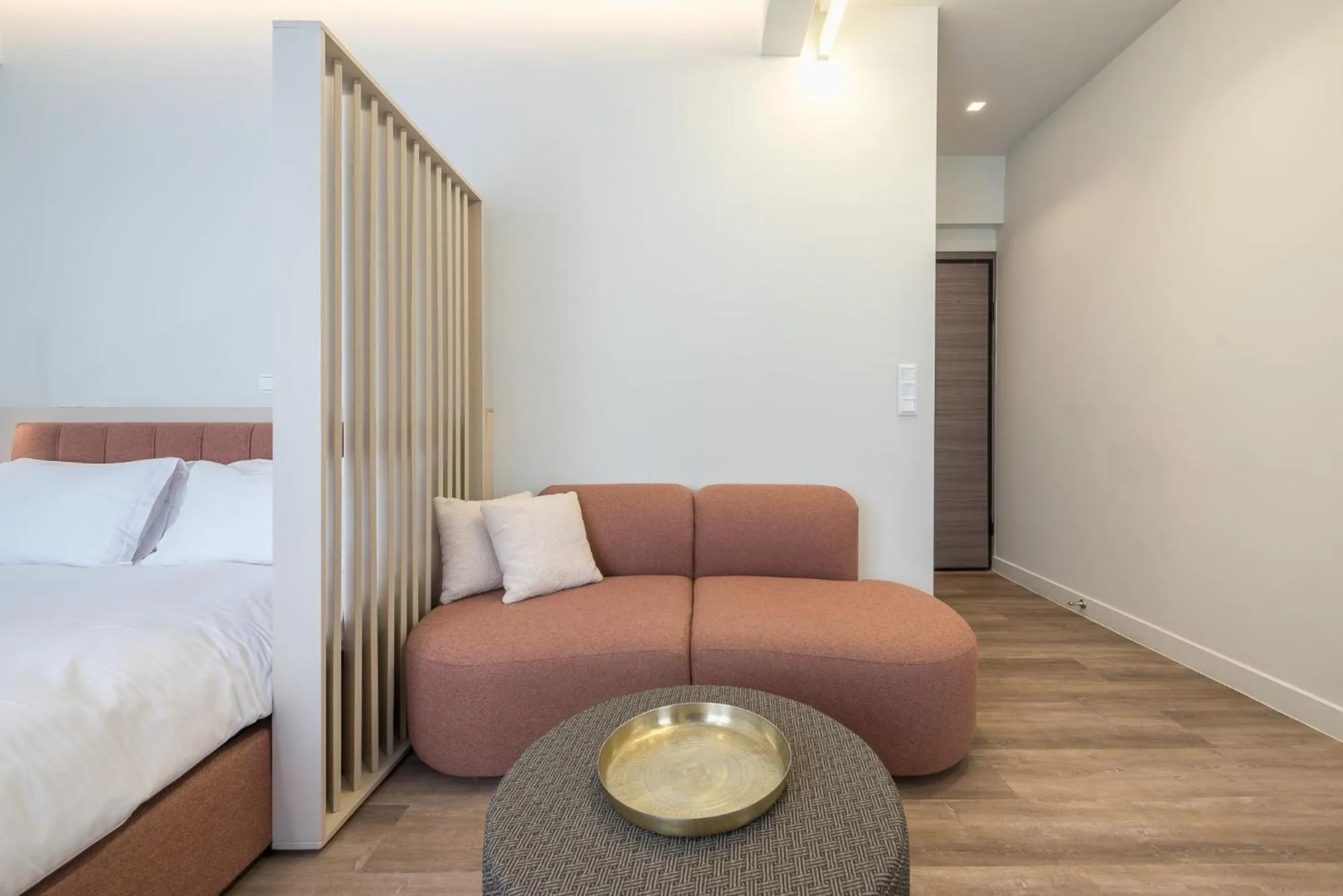 Seating area, Bed in Aeiphoria Suites & Rooms - Athens