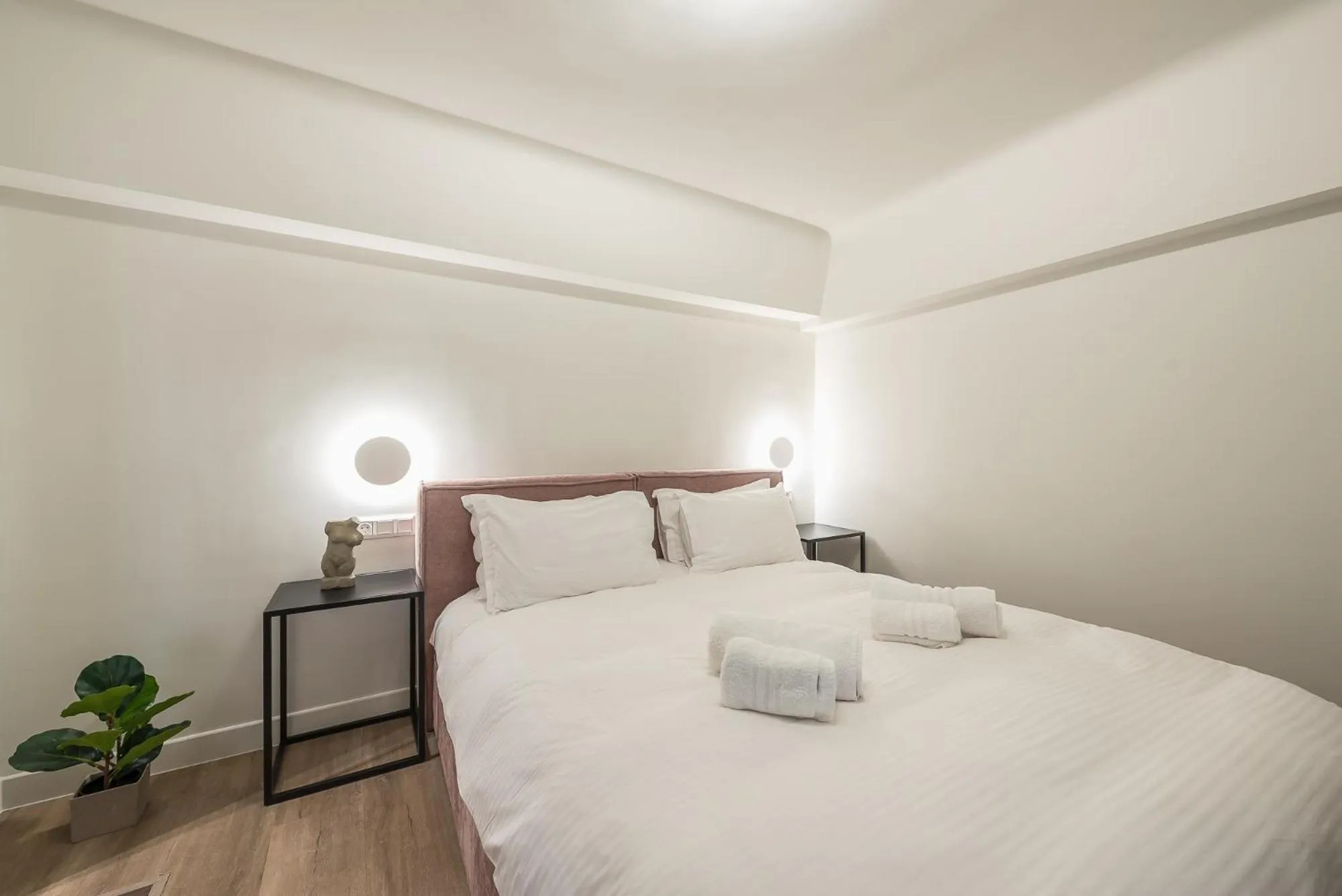 Bed in Aeiphoria Suites & Rooms - Athens