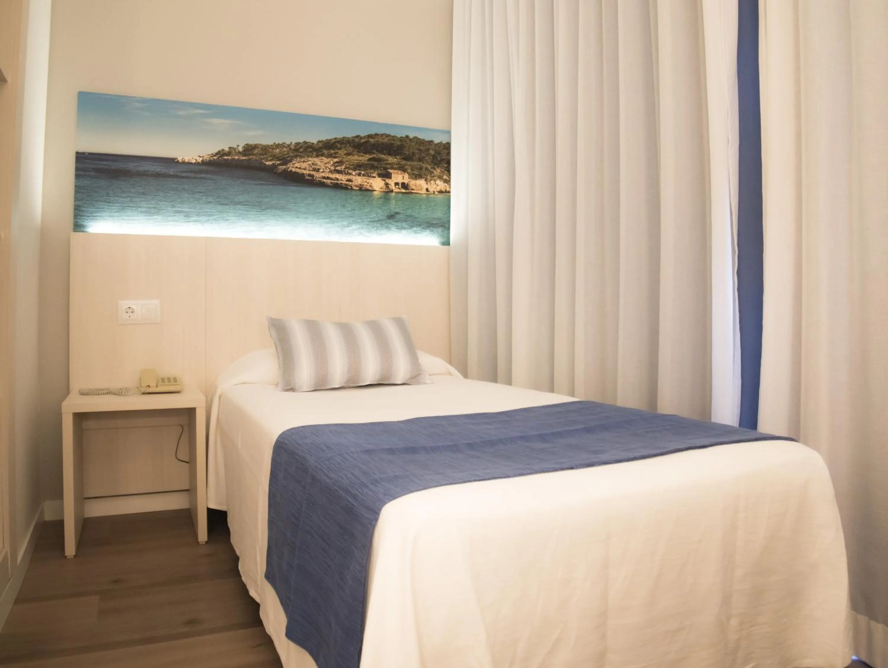 Bed in Seramar Hotel Luna Park Adults Only