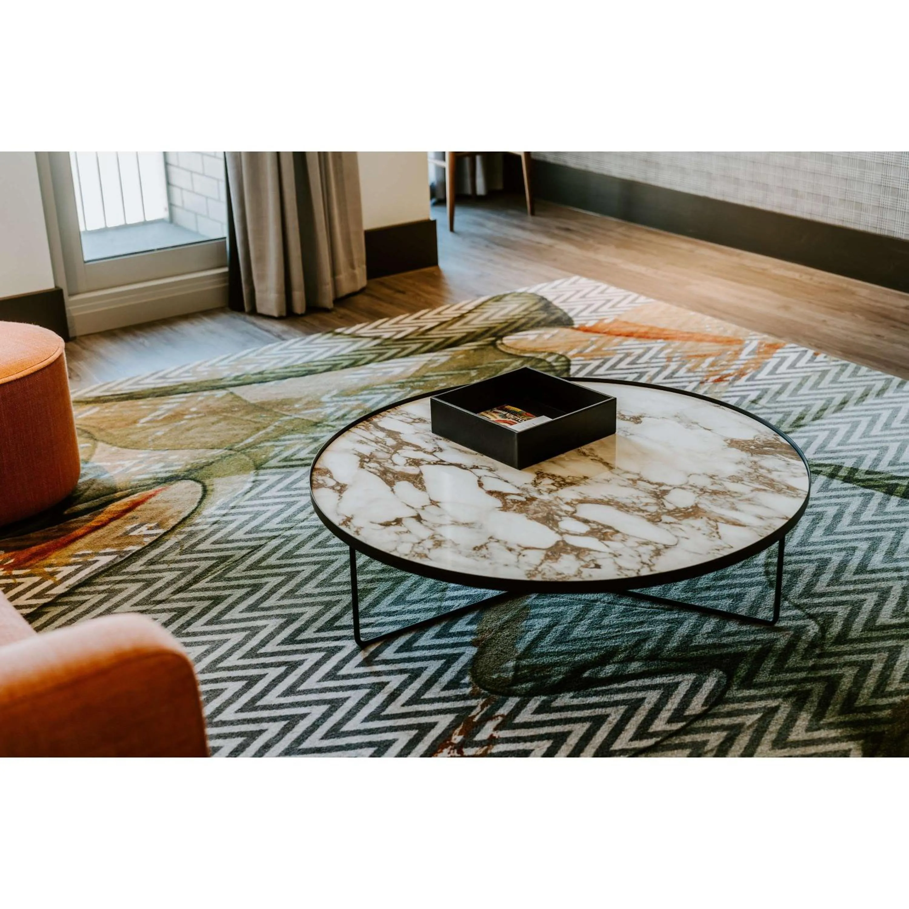 Living room in The Motley Hotel Richmond, Tapestry Collection by Hilton