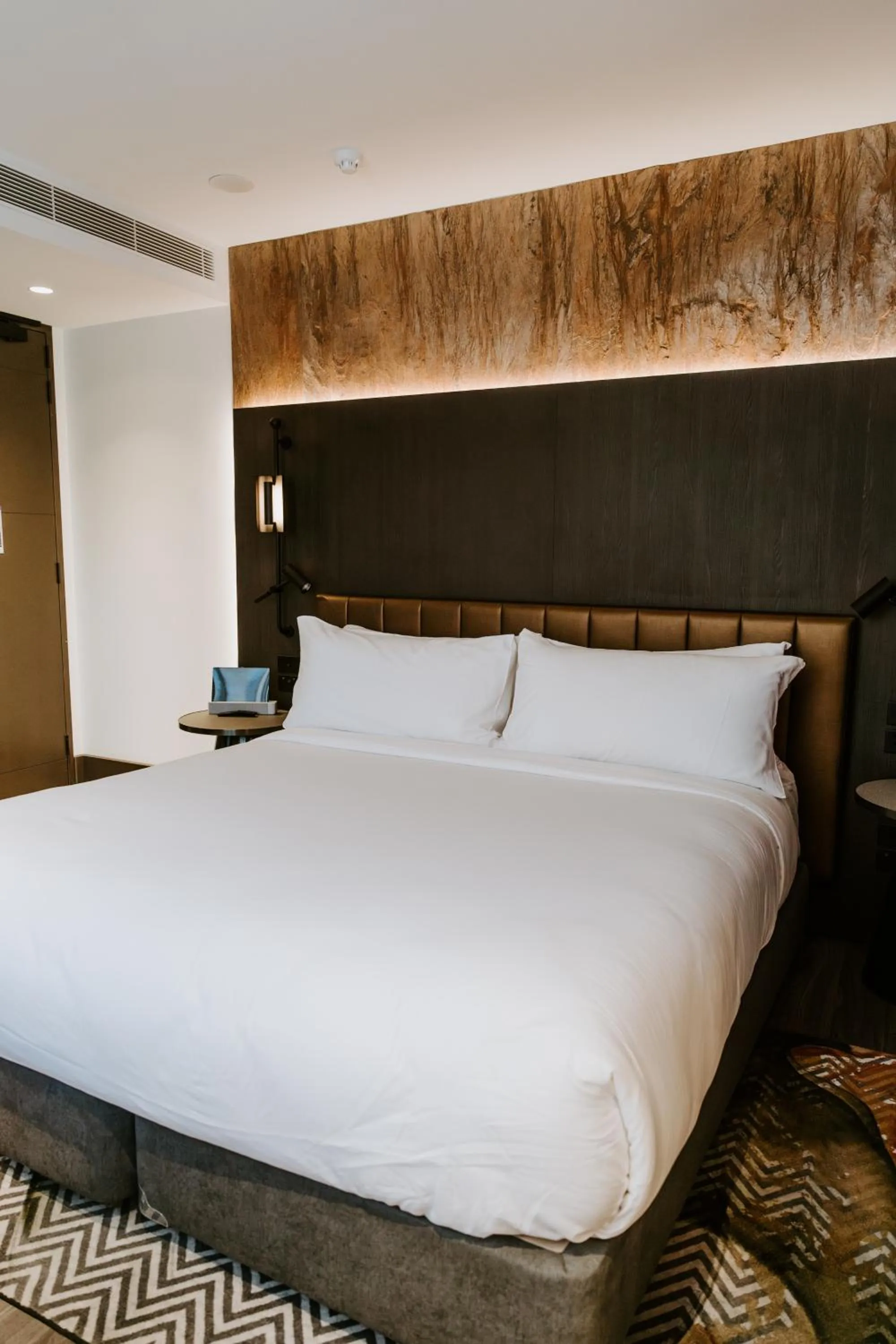 Bed in The Motley Hotel Richmond, Tapestry Collection by Hilton