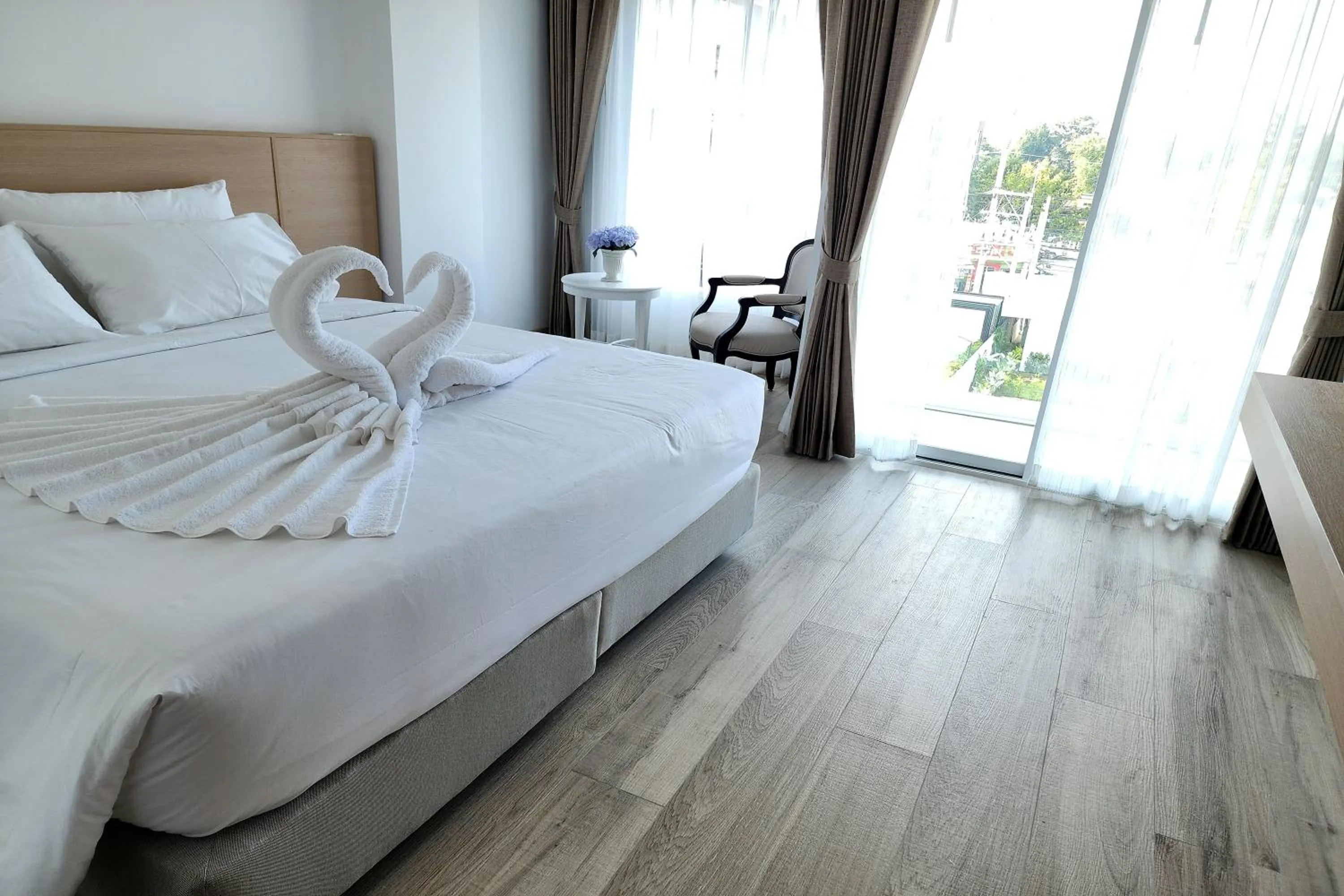 Bed in Arsh Boutique Hotel