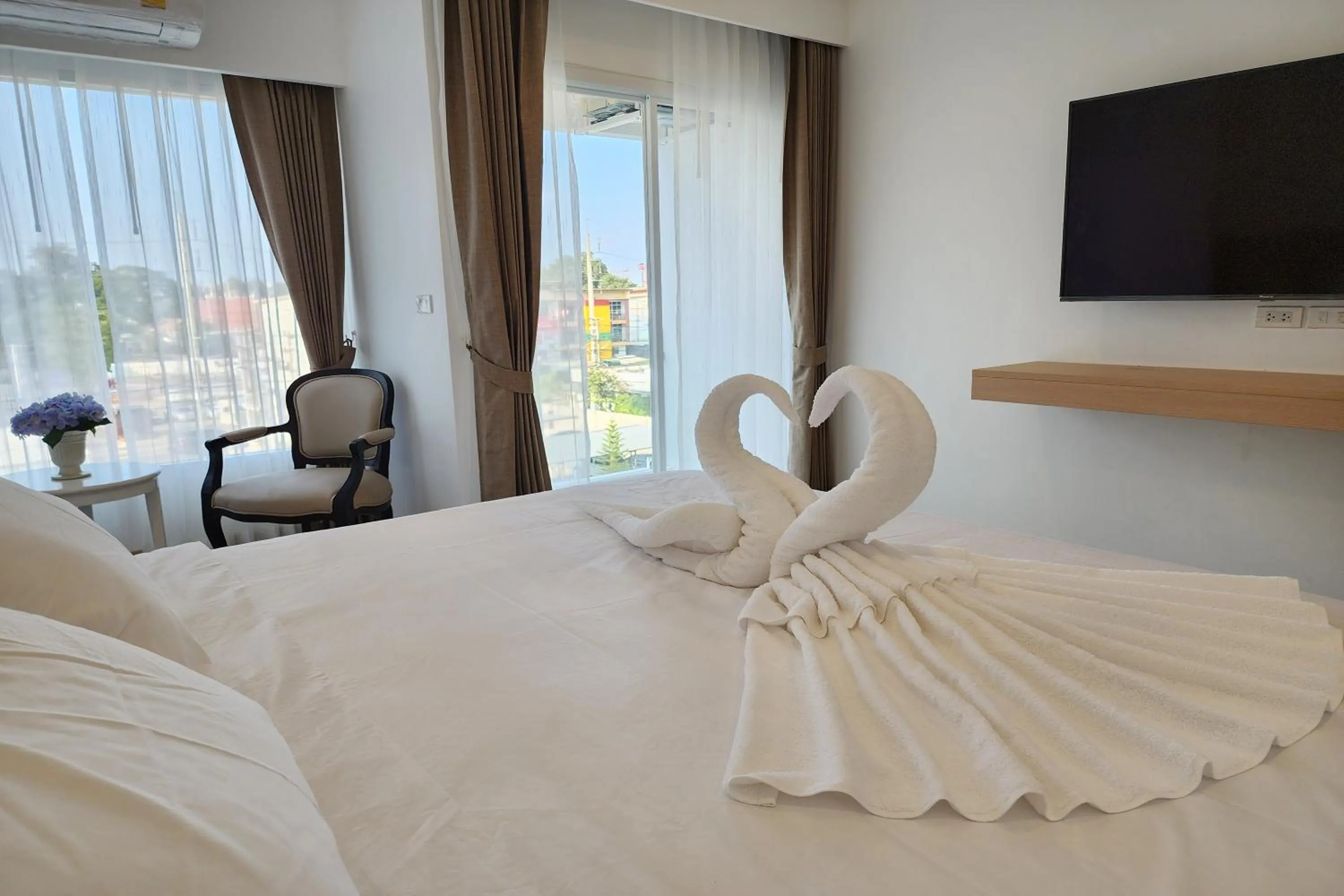 Bed in Arsh Boutique Hotel