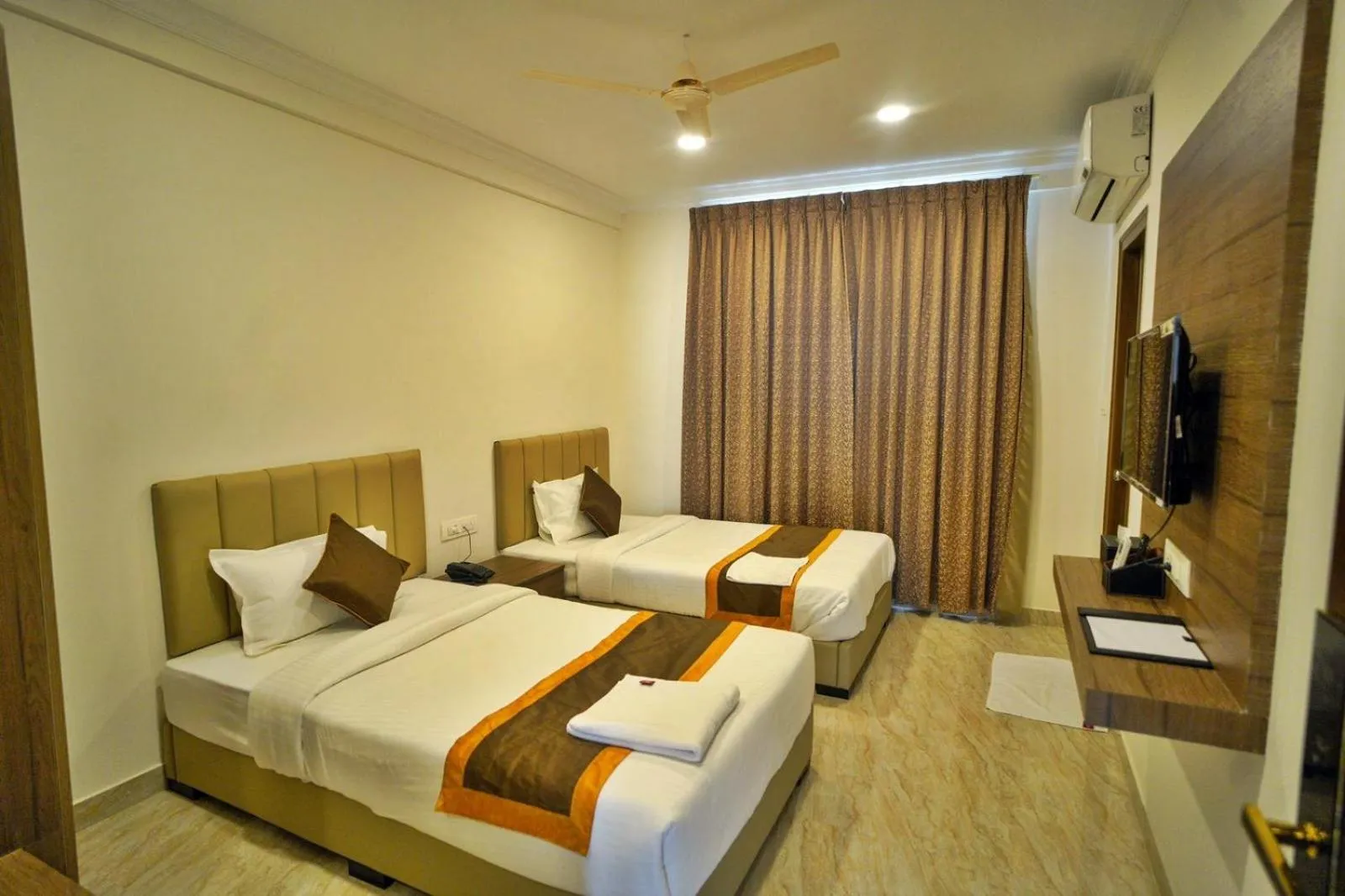 Bed in Hotel Sterling Inn Bangalore International Airport