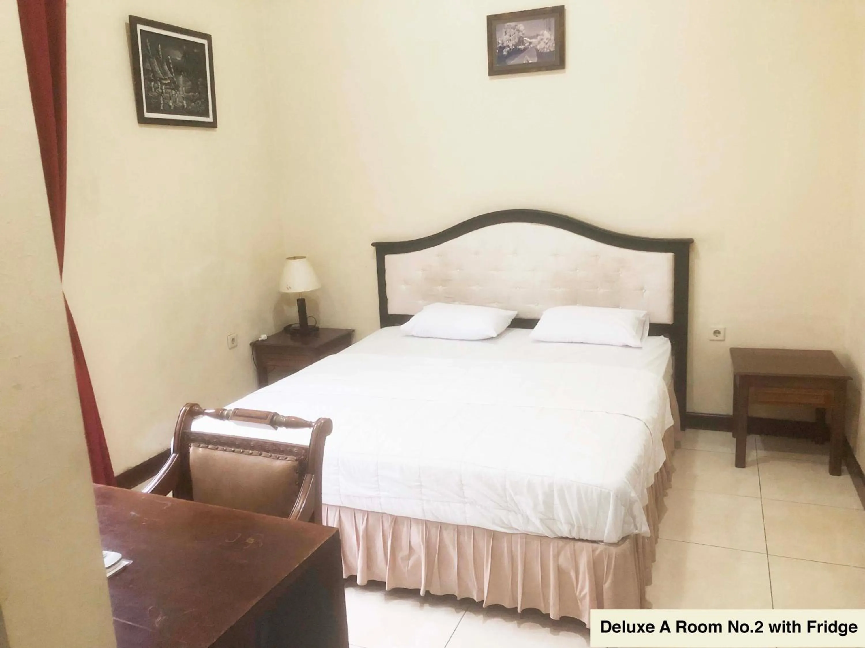 Bed in Ndalem Maharani Guest House