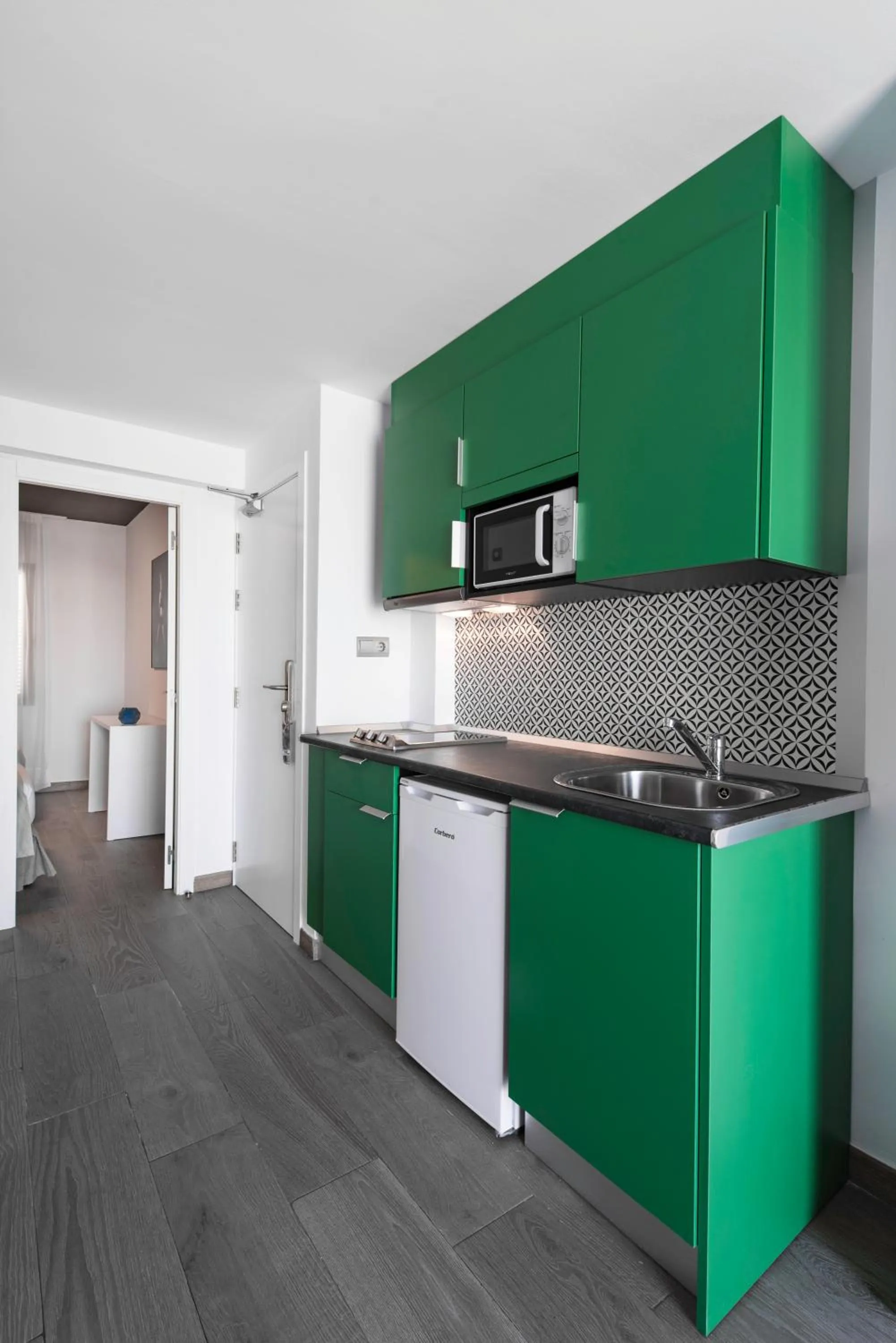 Kitchen or kitchenette in Aparthotel Vibra Mogambo - Adults only