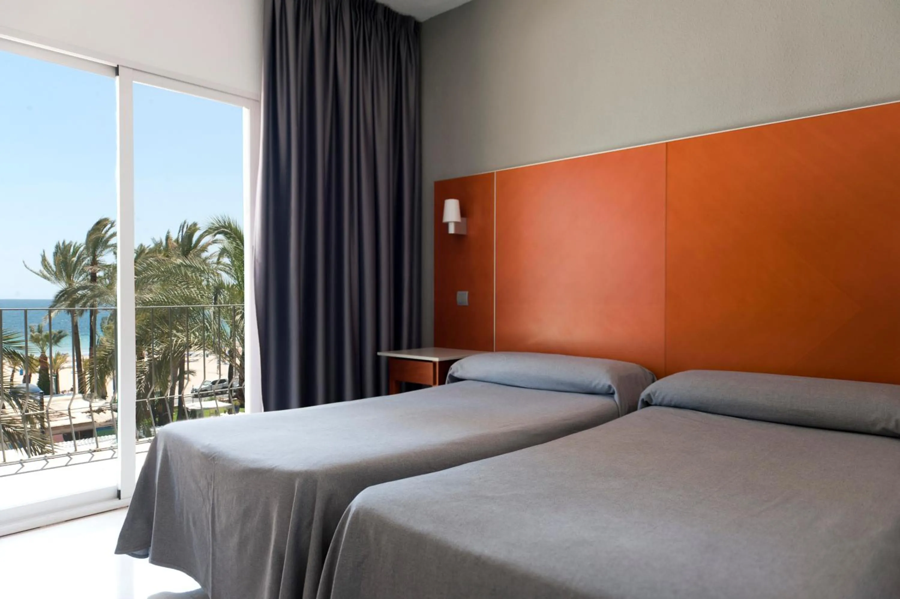 Bed in Hotel El Palmeral