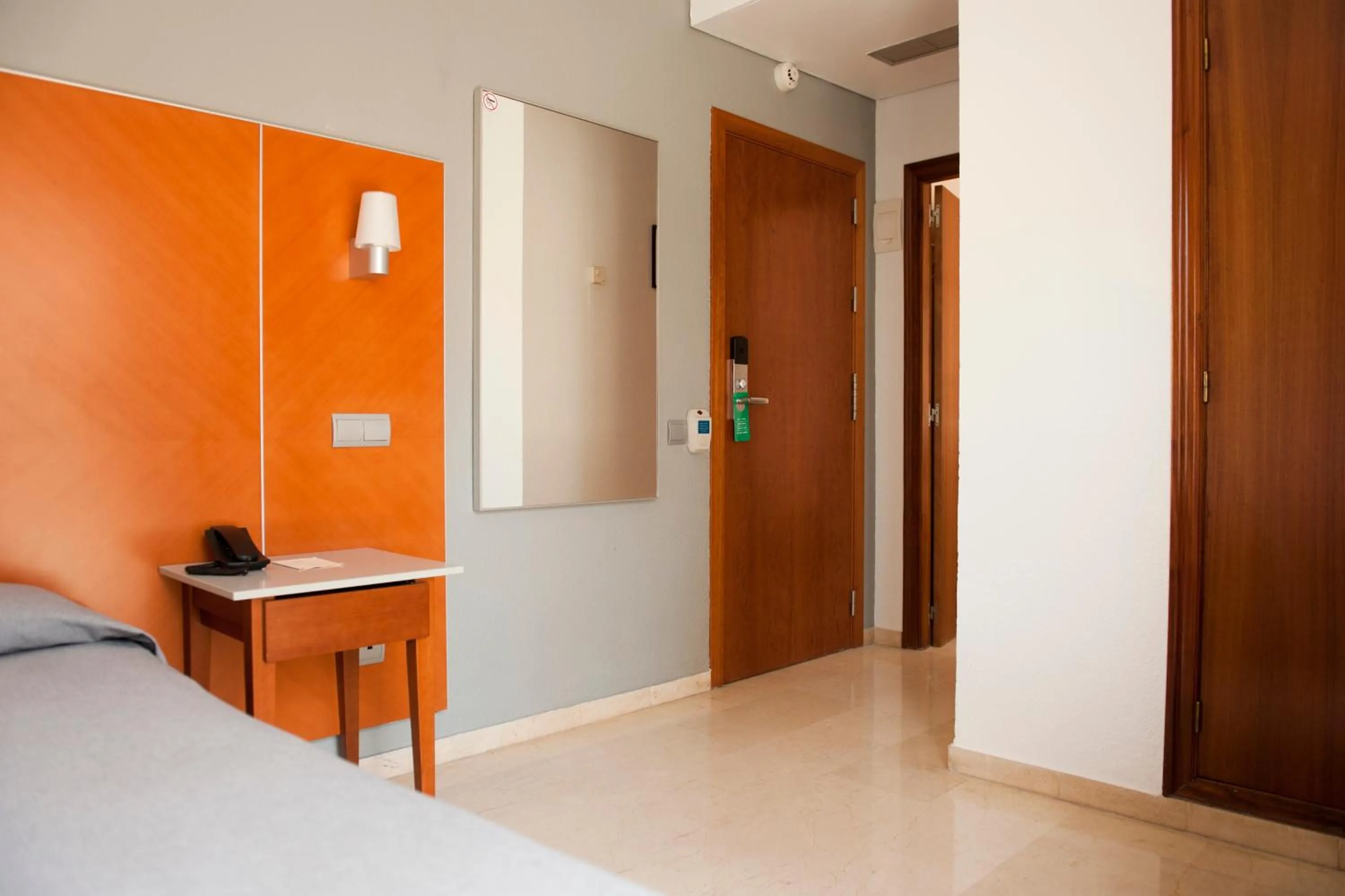 Bed in Hotel El Palmeral