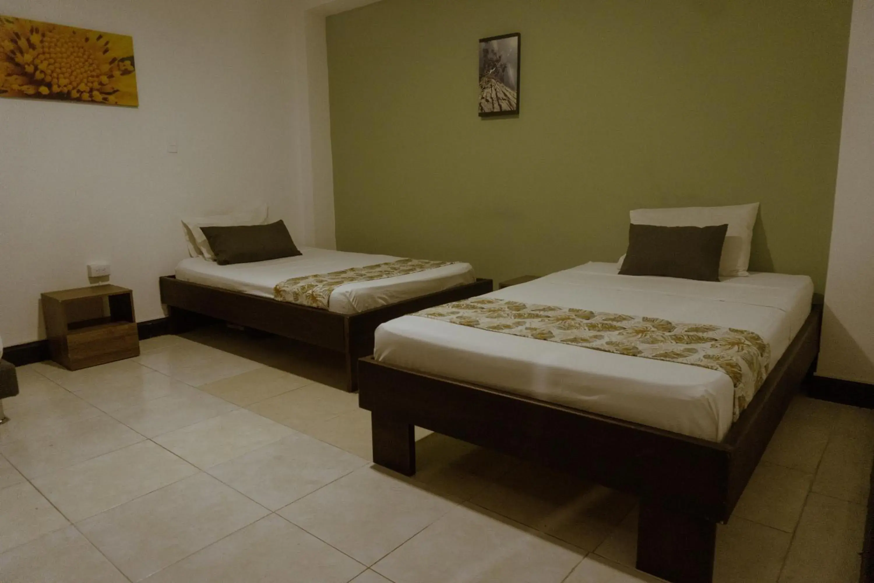 Triple Room with Private Bathroom in Tuki Hostel & Lounge Triple Room with Private Bathroom in Tuki Hostel & Lounge