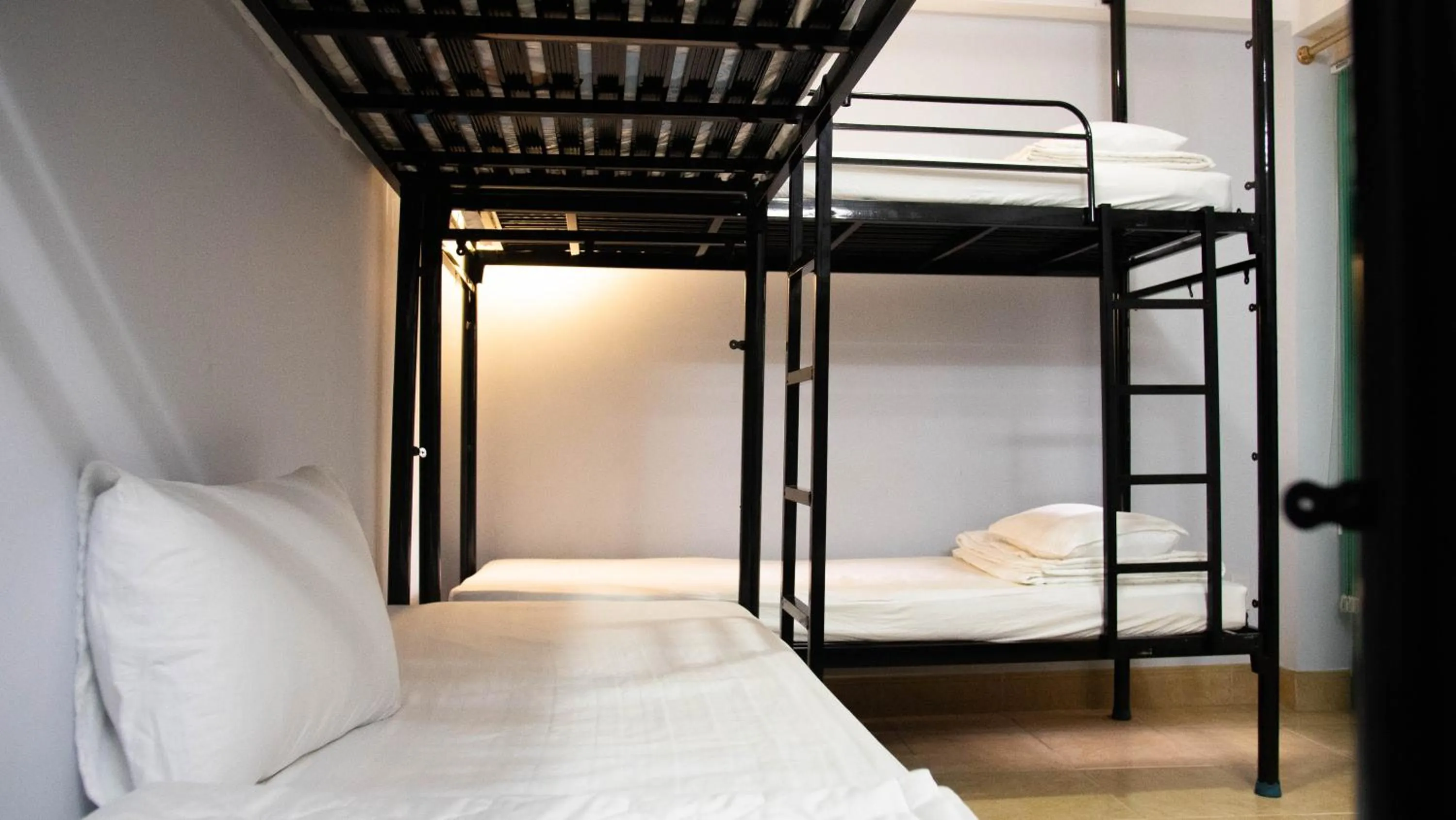 Bed in Language Exchange Hotel 3