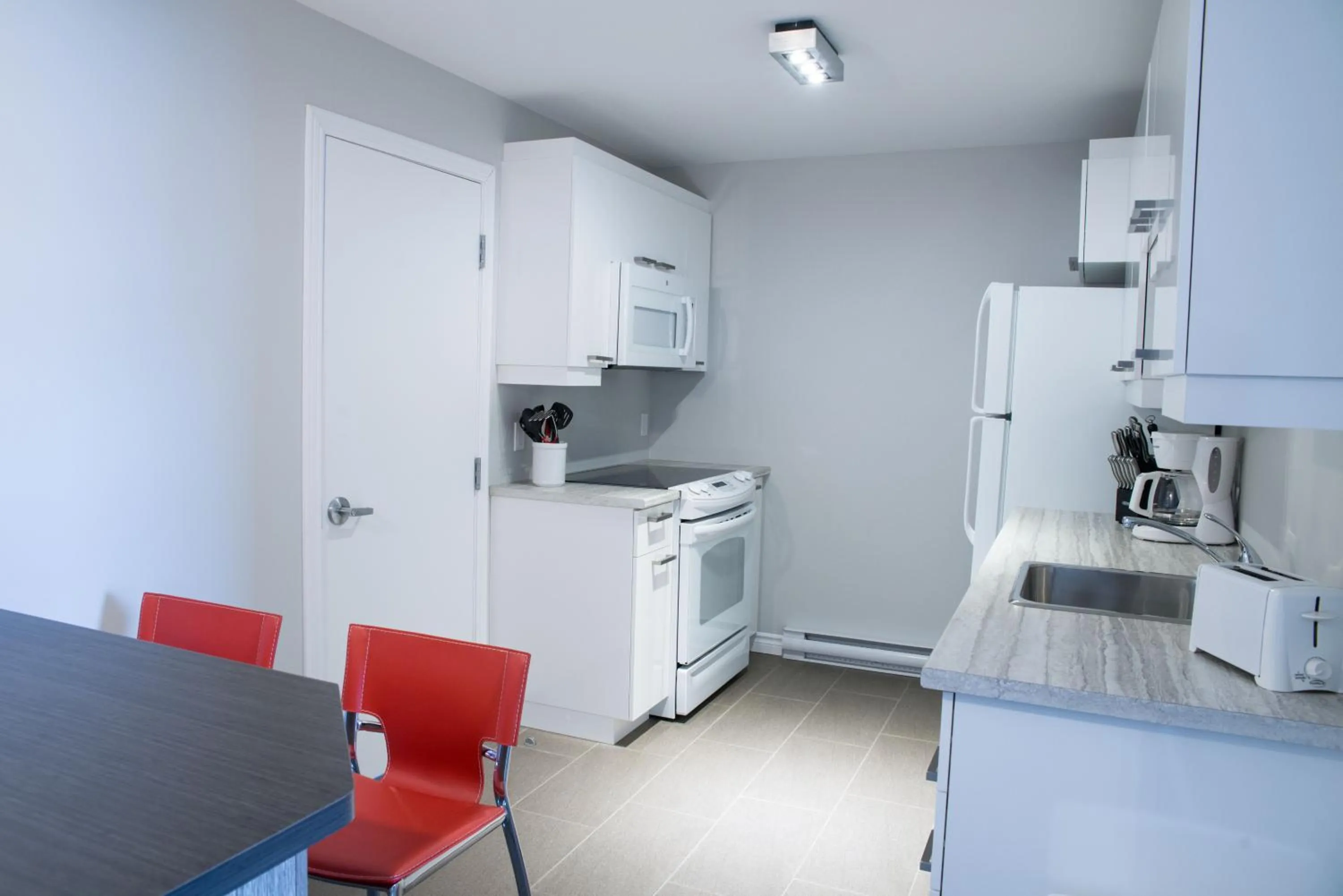 Kitchen or kitchenette in Le Chic-Urbain