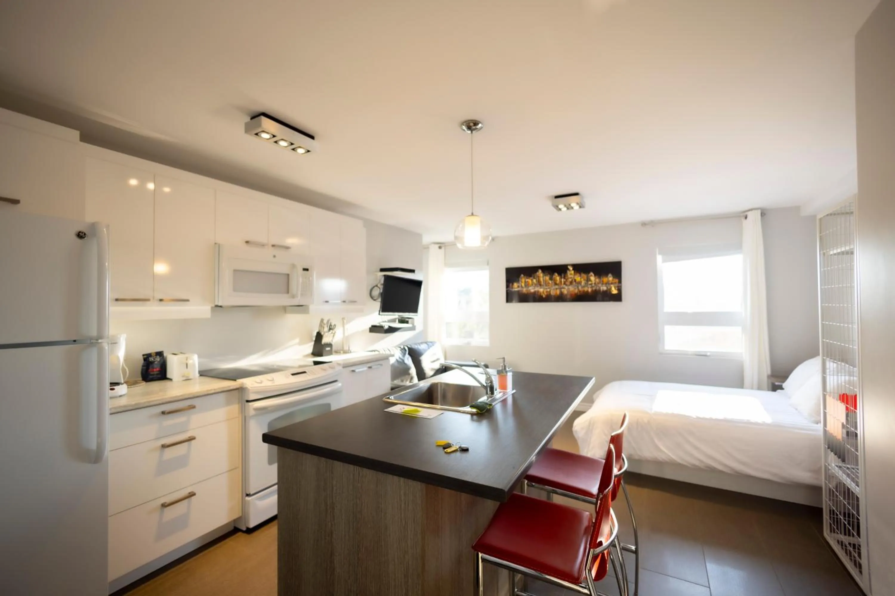 Photo of the whole room, Bed in Le Chic-Urbain