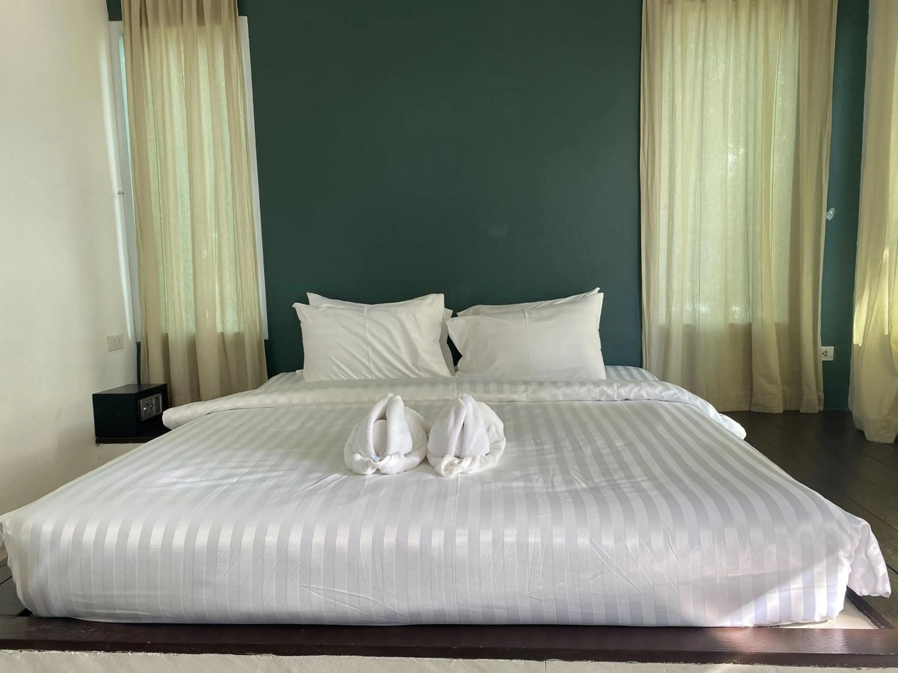Bed in White house bailan resort