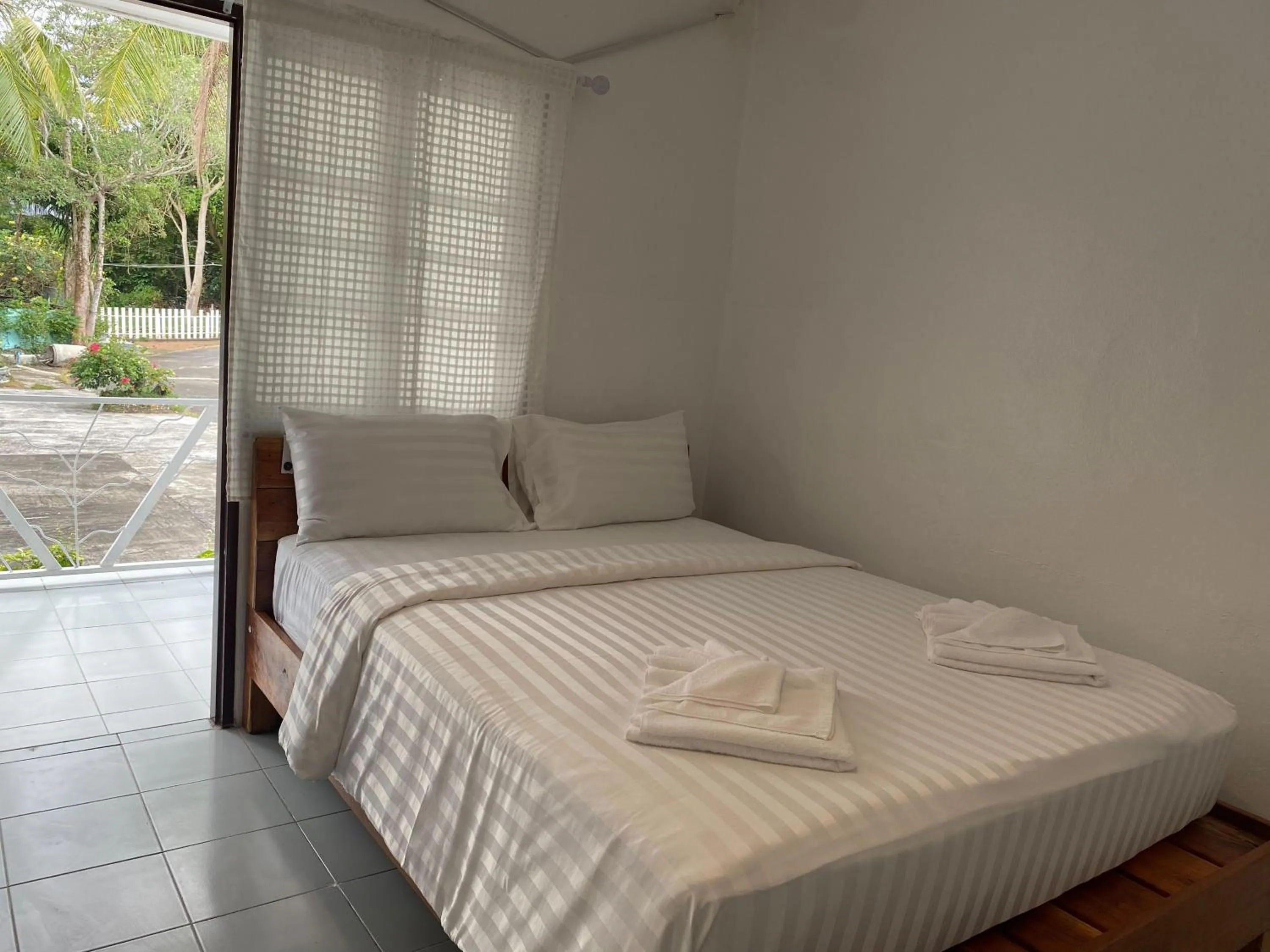 Bedroom, Bed in White house bailan resort
