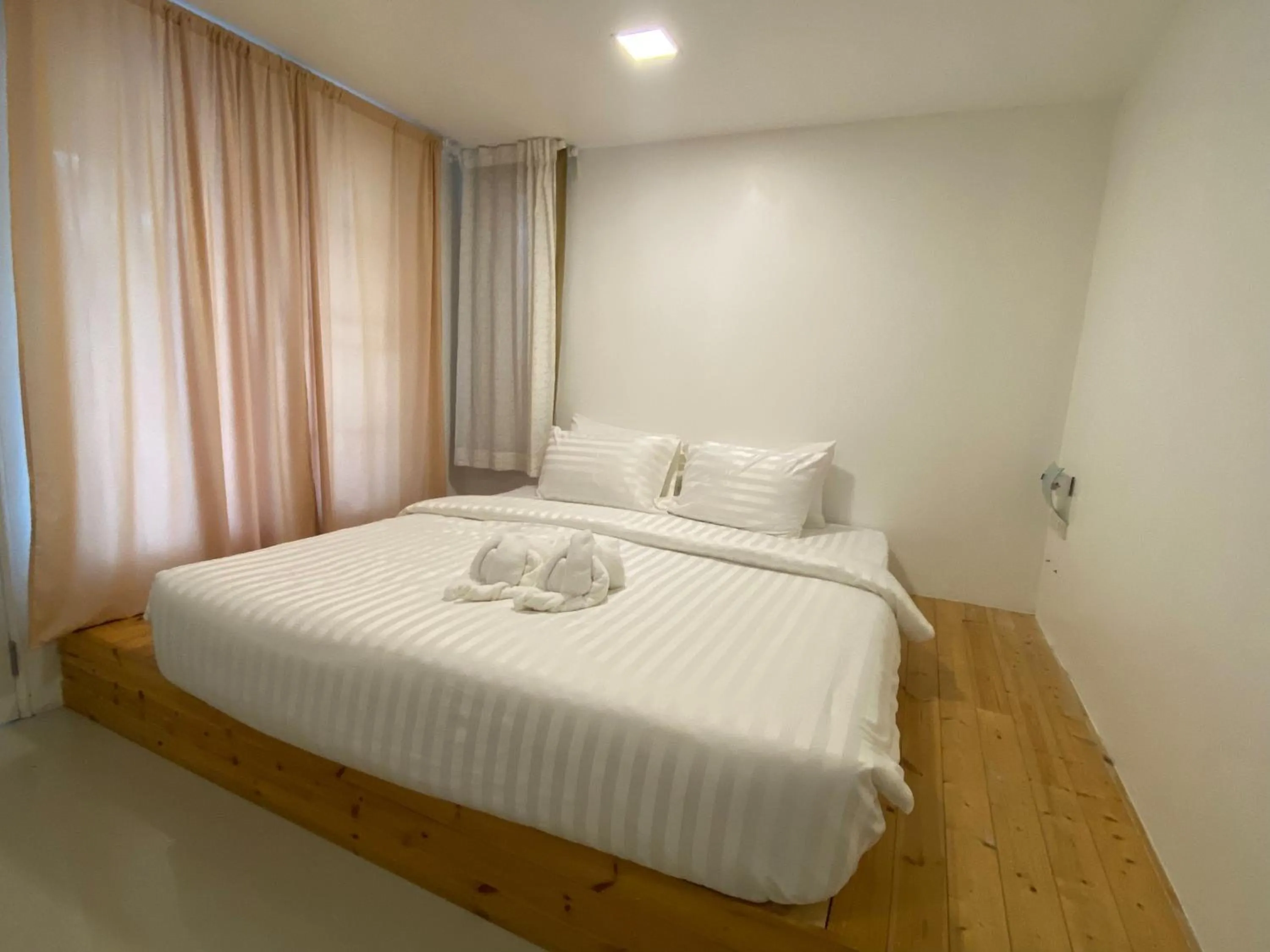 Bedroom, Bed in White house bailan resort