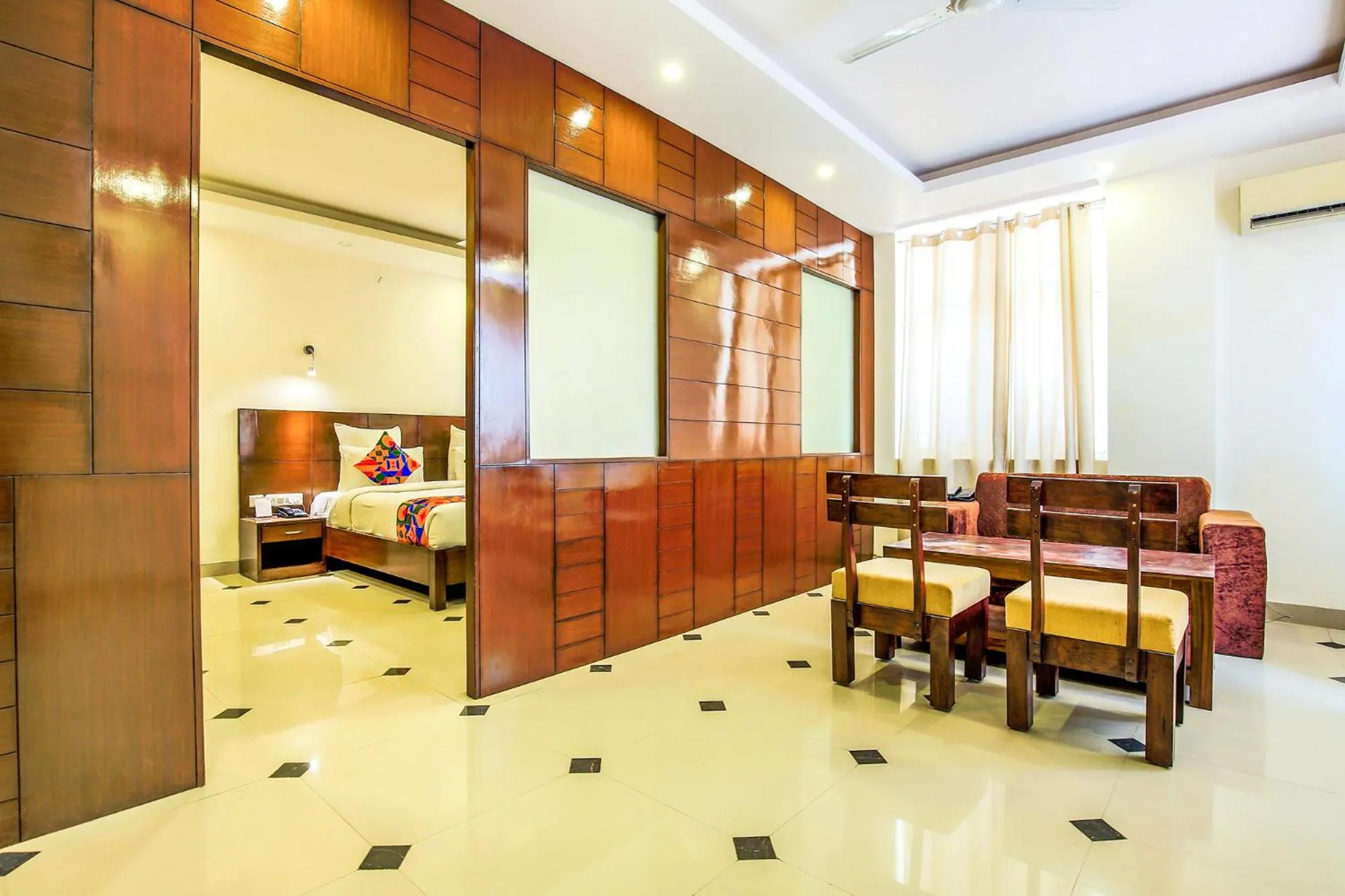 Bed in FabHotel Tipsyy Inn Suites