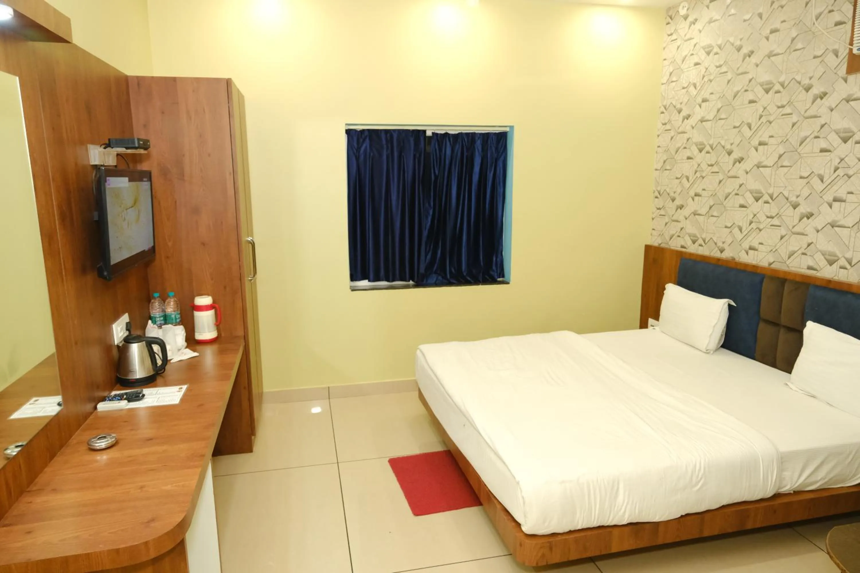 Photo of the whole room, Bed in Hotel Bharati