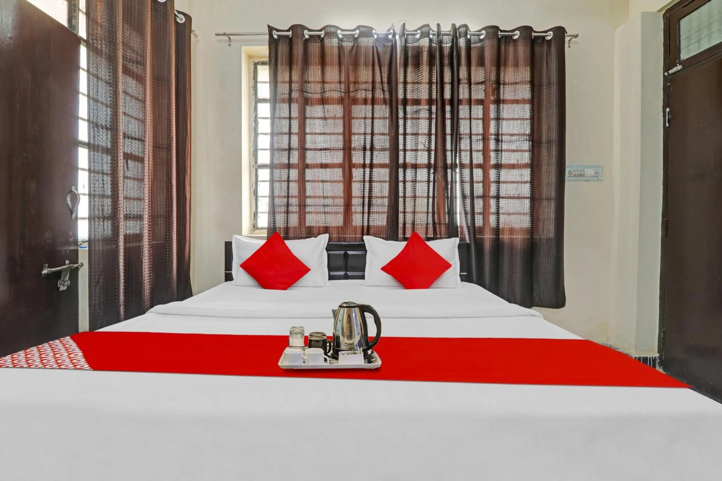 Bedroom, Bed in Hotel O by OYO Sunrise Inn