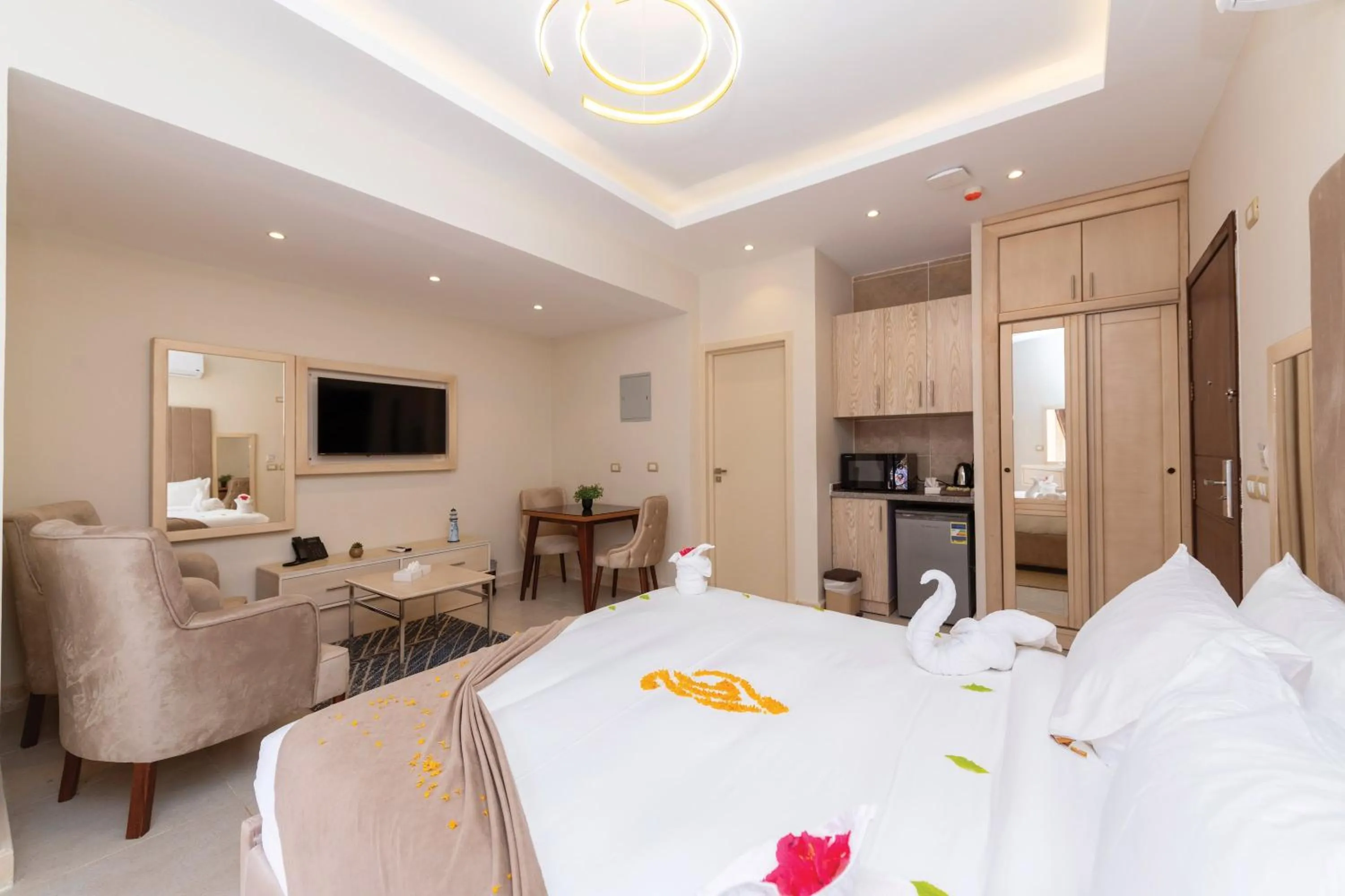 Kitchen or kitchenette, Bed in Marom Port Said Resort & Beach