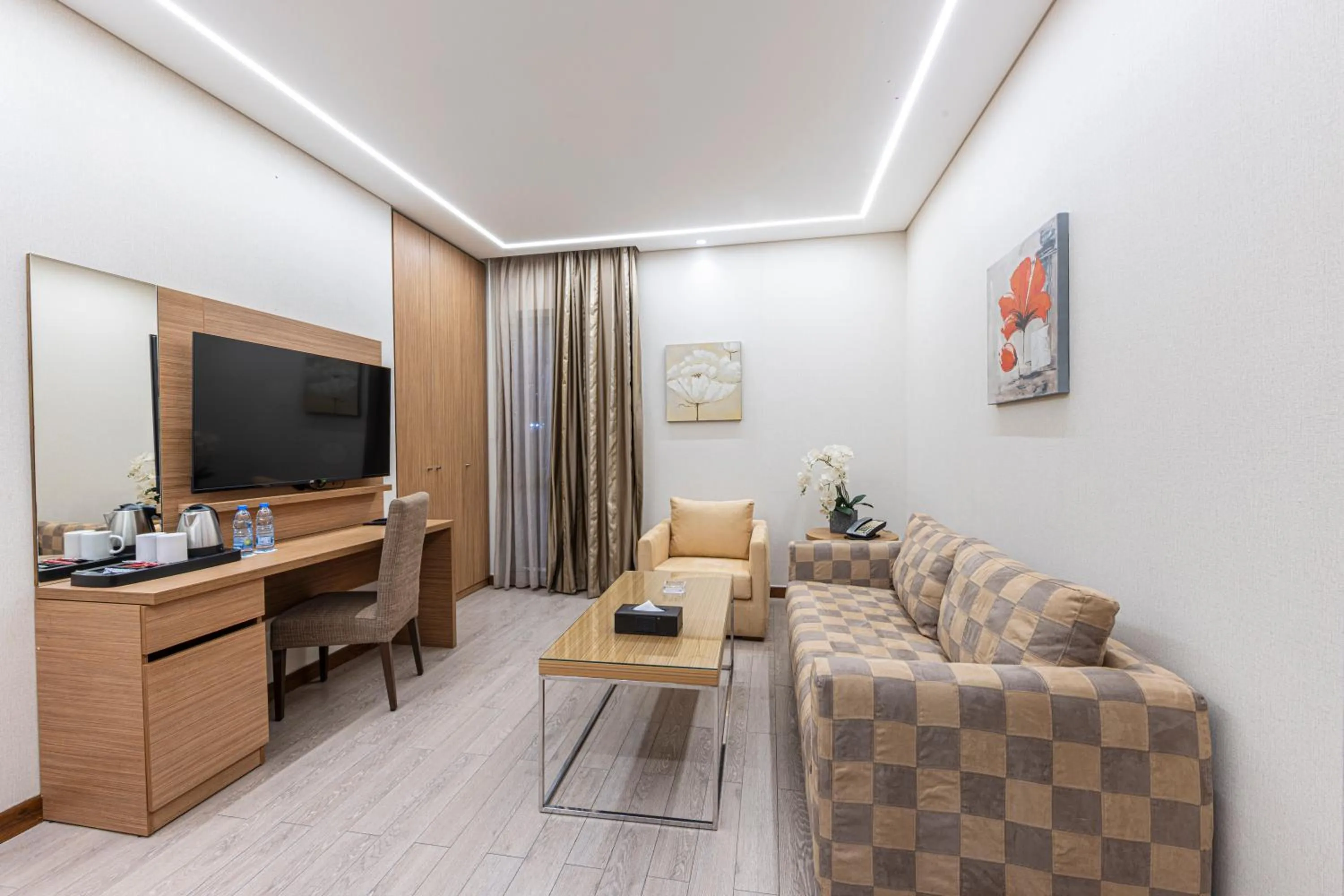 Living room in Heaven Prestige Hotel
