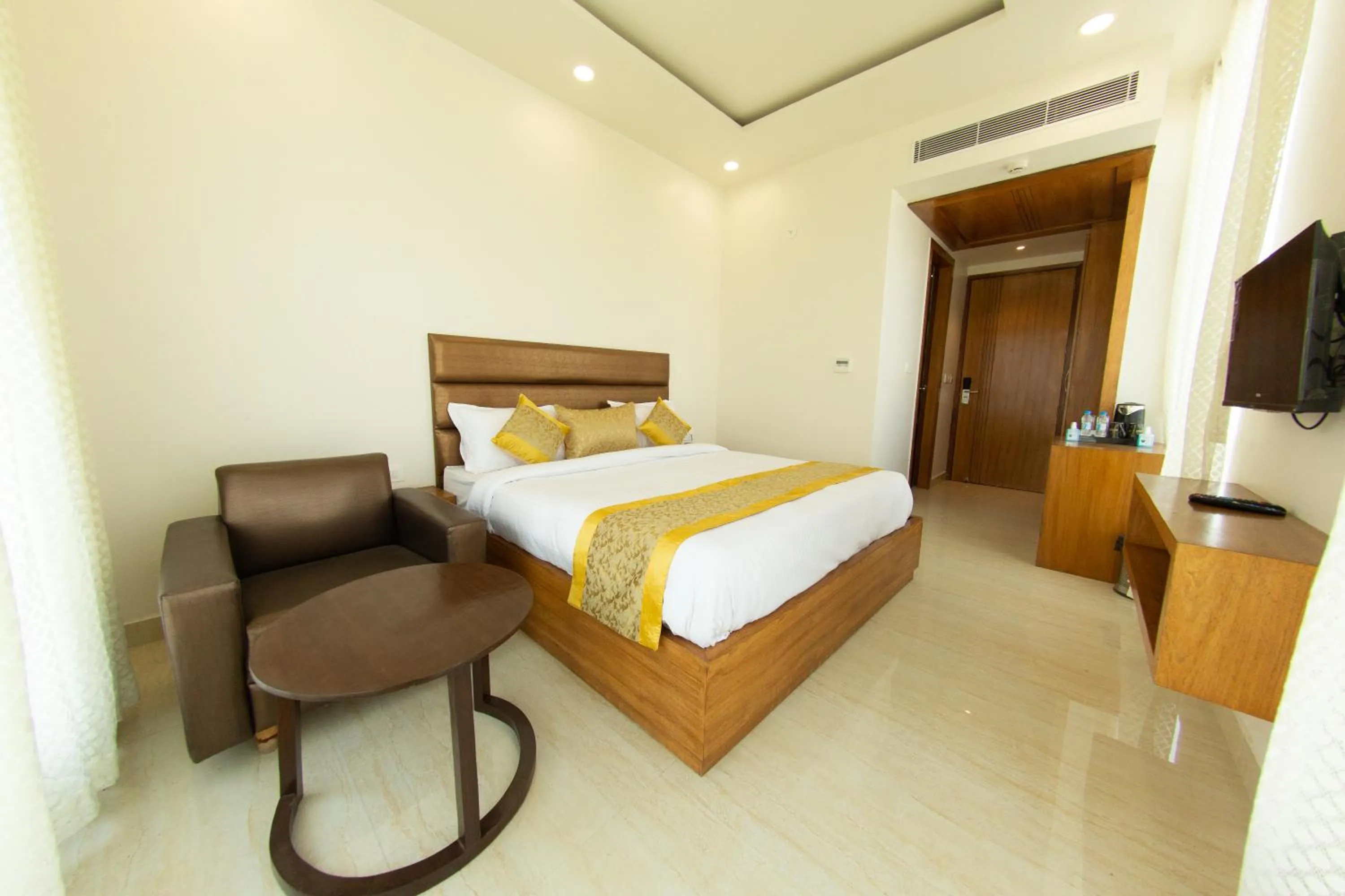 Photo of the whole room in Comfort Hotel Amritsar by Choice Hotels