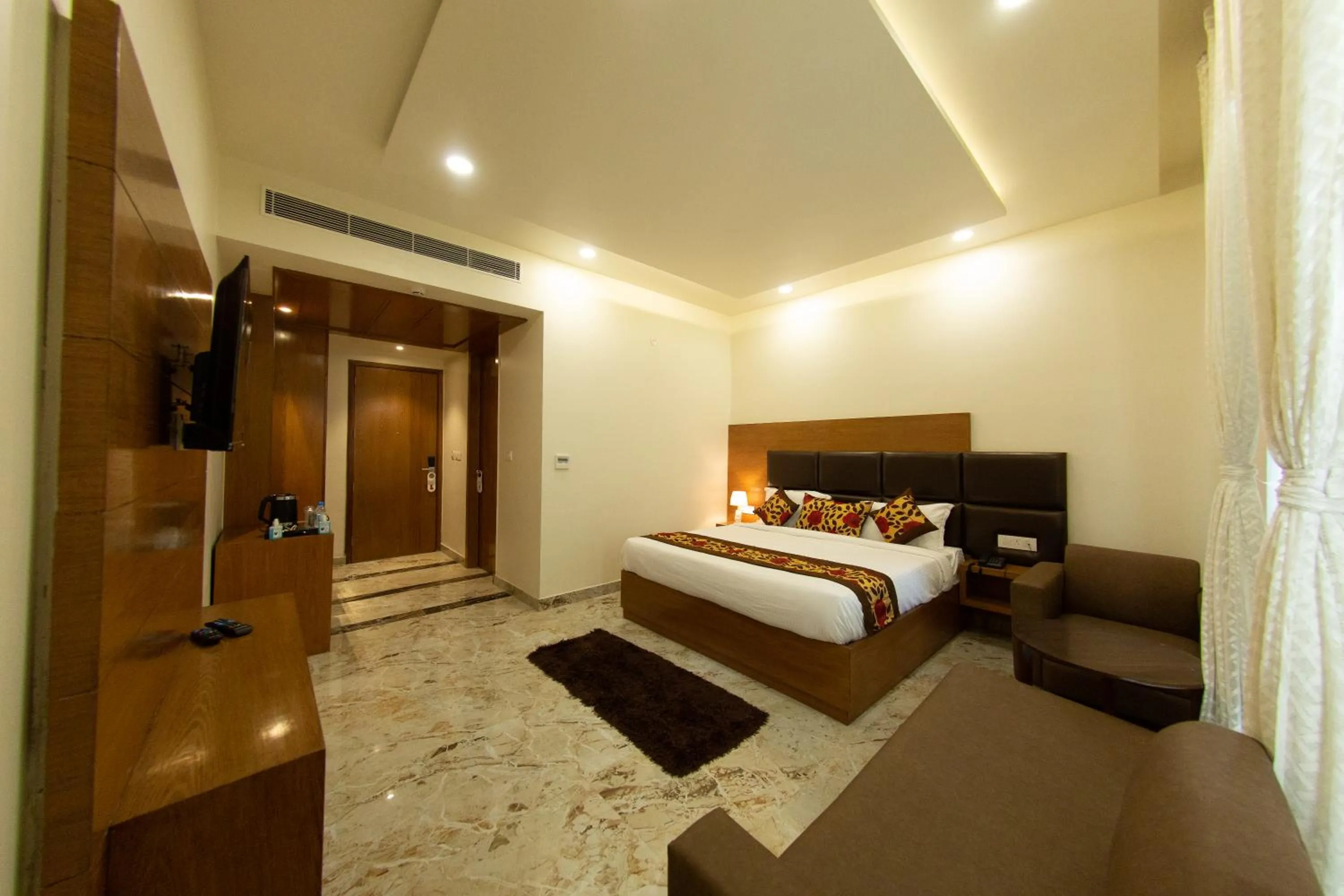 Photo of the whole room in Comfort Hotel Amritsar by Choice Hotels